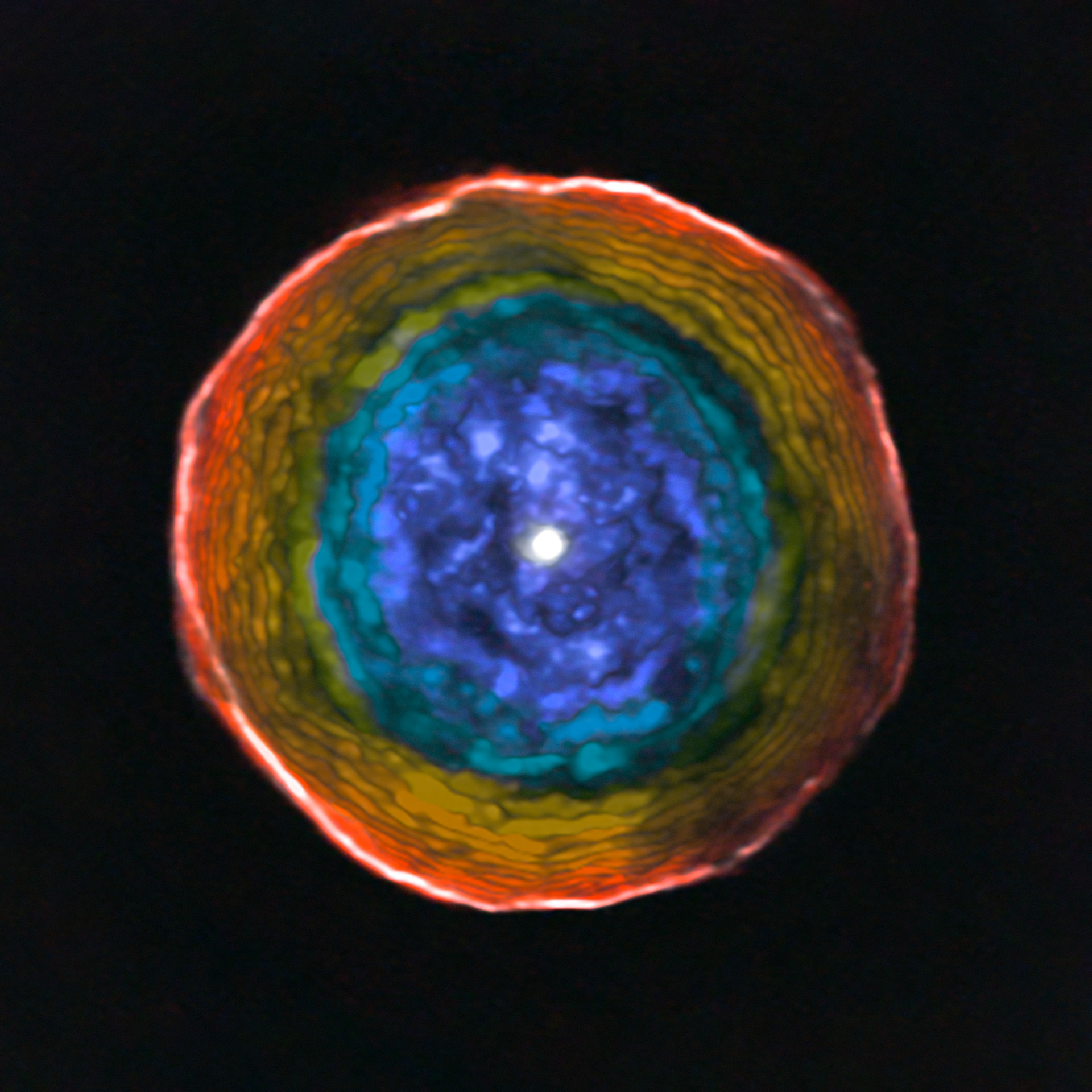 This image was created from ALMA data on the unusual red carbon star U Antliae and its surrounding shell of material. The colours show the motion of the glowing material in the shell along the line of sight to the Earth. Blue material lies between us and the central star, and is moving towards us. Red material around the edge is moving away from the star, but not towards the Earth.  For clarity this view does not include the material on the far side of the star, which is receding from us in a symmetrical manner.  Credit: ALMA (ESO/NAOJ/NRAO), F. Kerschbaum