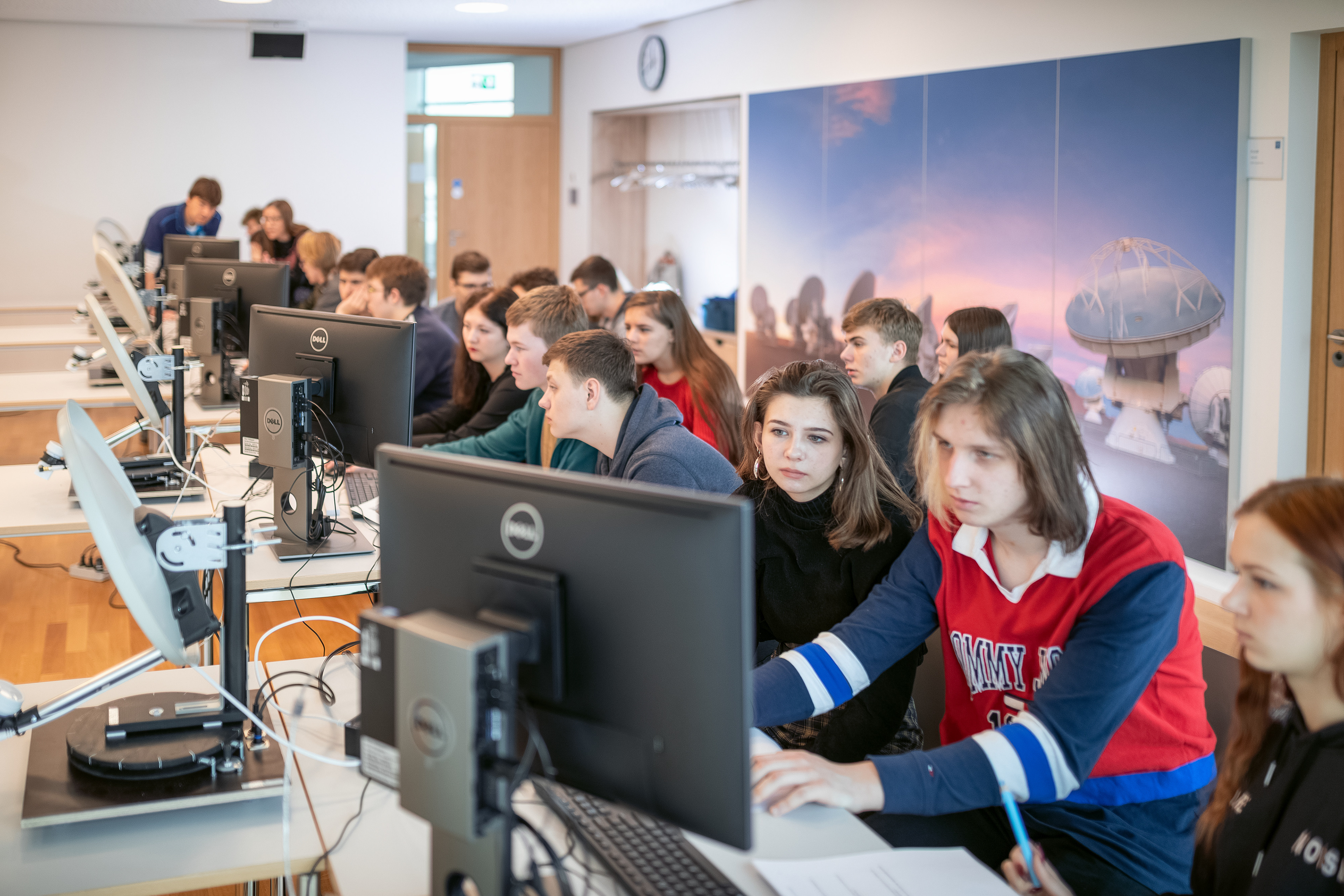 ESO Education Coordinator Wolfgang Vieser and students in the ESO Supernova.