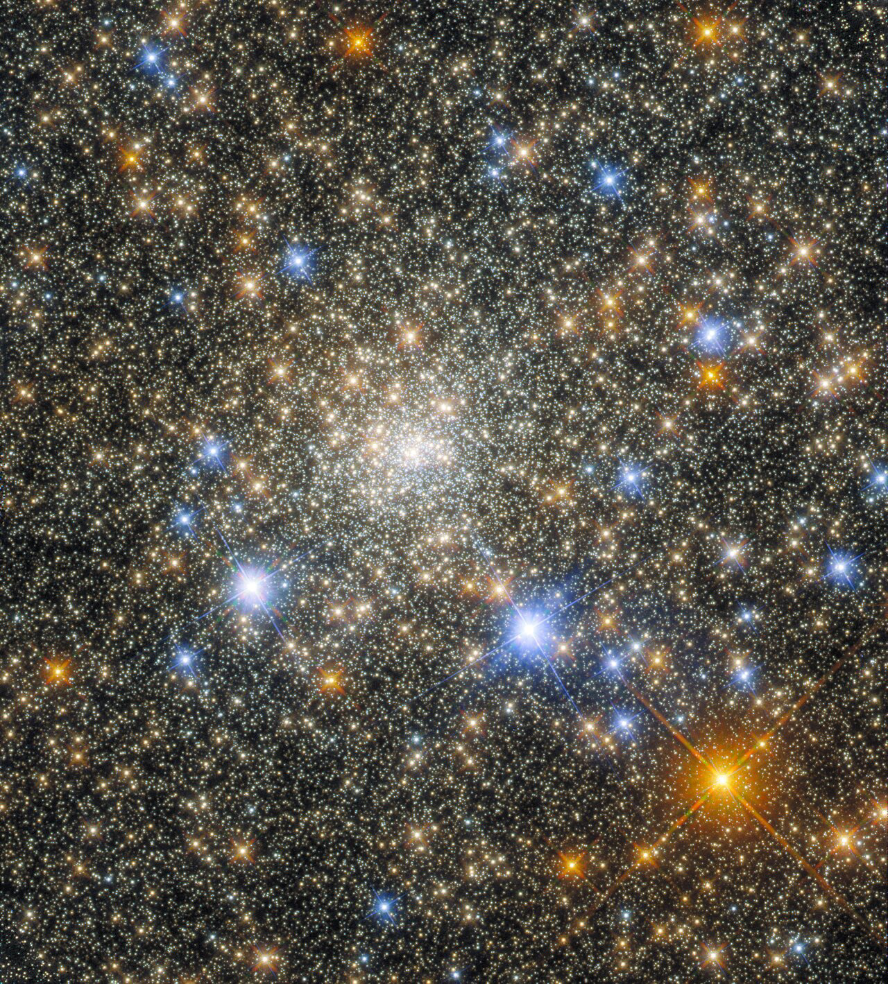The globular cluster Terzan 2 in the constellation Scorpio features in this observation from the NASA/ESA Hubble Space Telescope. Globular clusters are stable, tightly gravitationally bound clusters of tens of thousands to millions of stars found in a wide variety of galaxies. The intense gravitational attraction between the closely packed stars gives globular clusters a regular, spherical shape. As a result, images of the hearts of globular clusters, such as this observation of Terzan 2, are crowded with a multitude of glittering stars.    Hubble used both its Advanced Camera for Surveys and its Wide Field Camera 3 in this observation, taking advantage of the complementary capabilities of these instruments. Despite having only one primary mirror, Hubble’s design allows multiple instruments to be used to inspect astronomical objects. Light from distant astronomical objects enters Hubble and is collected by the telescope's 2.4-metre primary mirror; it is then reflected off the secondary mirror into the depths of the telescope, where smaller mirrors can direct light into individual instruments.   Each of the four operational instruments on Hubble is a masterpiece of astronomical engineering in its own right, and contains an intricate array of mirrors and other optical elements to remove any aberrations or optical imperfections from observations, as well as filters which allow astronomers to observe specific wavelength ranges. The mirrors inside each instrument also correct for the slight imperfection of Hubble's primary mirror. The end result is a crystal-clear observation, such as this glittering portrait of Terzan 2.  Links Video of Portrait of a Globular Cluster Credit:  ESA/Hubble & NASA, R. Cohen