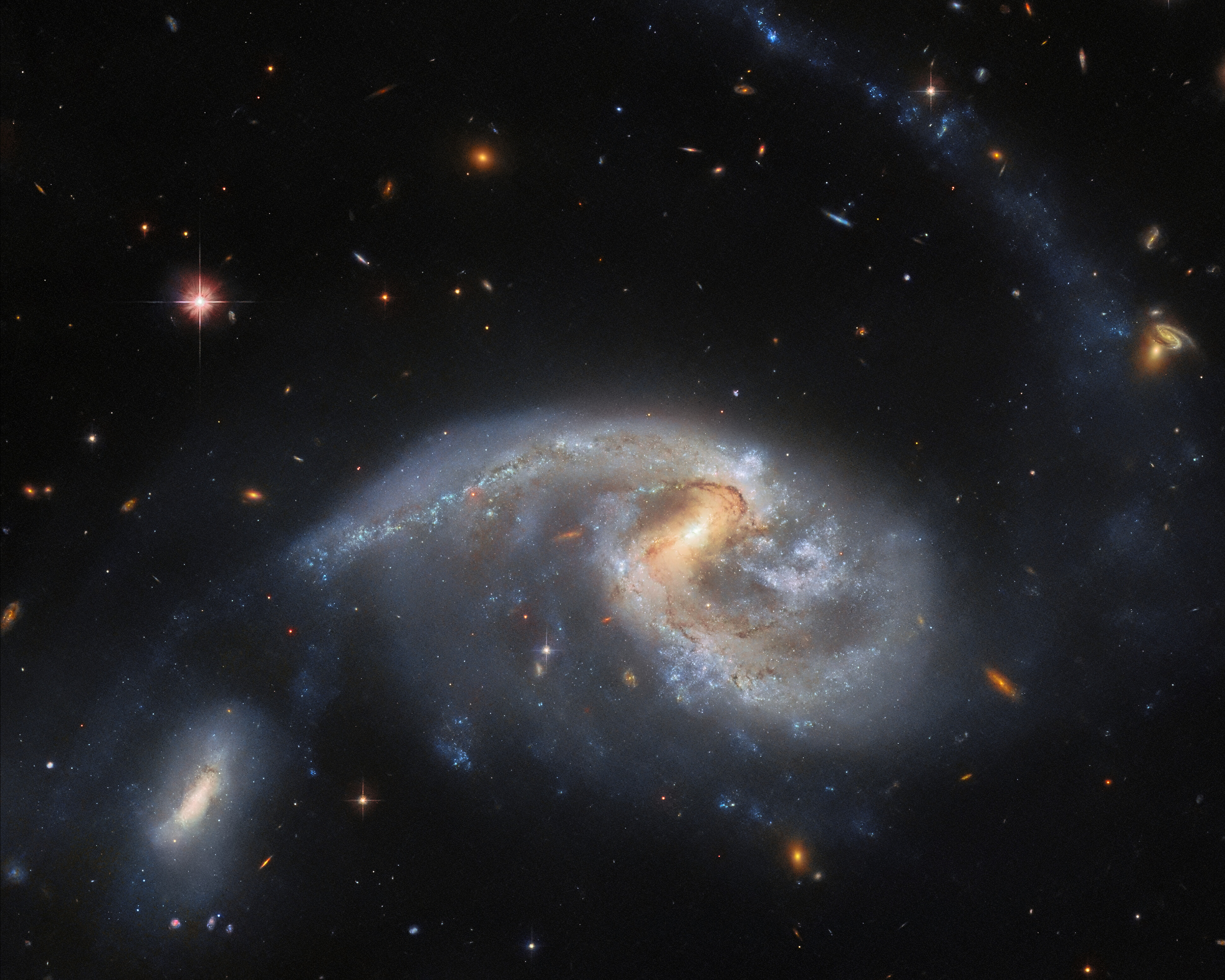 Two’s company - Credit: ESA/Hubble & NASA, L. Galbany, J. Dalcanton, Dark Energy Survey/DOE/FNAL/DECam/CTIO/NOIRLab/NSF/AURA