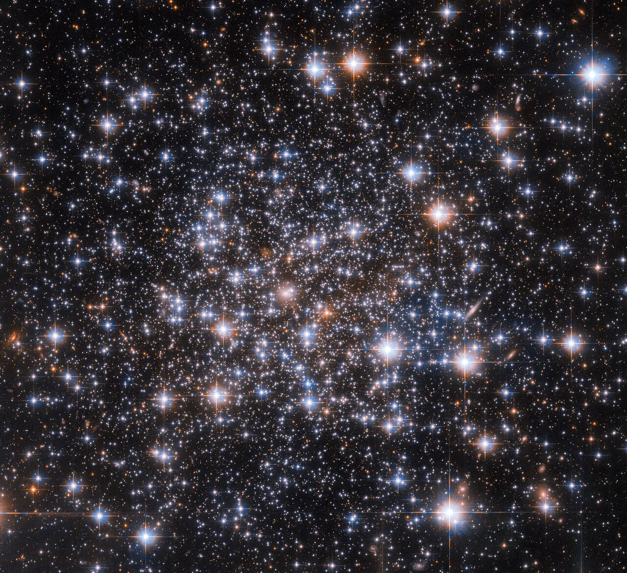 Like Sherlock Holmes’s magnifying glass writ large, the NASA/ESA Hubble Space Telescope has been used to peer into an astronomical mystery in search of clues. The enigma in question concerns the globular cluster Ruprecht 106, which is pictured in this image. While the constituent stars of globular clusters all formed at approximately the same location and time, it turns out that almost all globular clusters contain groups of stars with distinct chemical compositions. These distinct chemical fingerprints are left by groups of stars with very slightly different ages or compositions from the rest of the cluster. A tiny handful of globular clusters do not possess these multiple populations of stars, and Ruprecht 106 is a member of this enigmatic group.  Hubble captured this star-studded image using one of its most versatile instruments; the Advanced Camera for Surveys (ACS). Much like the stars in globular clusters, Hubble’s instruments also have distinct generations: ACS is a third generation instrument which replaced the original Faint Object Camera in 2002. Some of Hubble’s other instruments have also gone through three iterations: the Wide Field Camera 3 replaced the Wide Field and Planetary Camera 2 (WFPC2) during the final servicing mission to Hubble. WFPC2 itself replaced the original Wide Field and Planetary Camera, which was installed on Hubble at launch.   Astronauts on the NASA Space Shuttle serviced Hubble in orbit a total of five times, and were able to either upgrade aging equipment or replace instruments with newer, more capable versions. This high-tech tinkering in low Earth orbit has helped keep Hubble at the cutting edge of astronomy for more than 3 decades.  Links Video of Hubble Investigates an Enigmatic Globular Cluster Credit: ESA/Hubble & NASA, A. Dotter