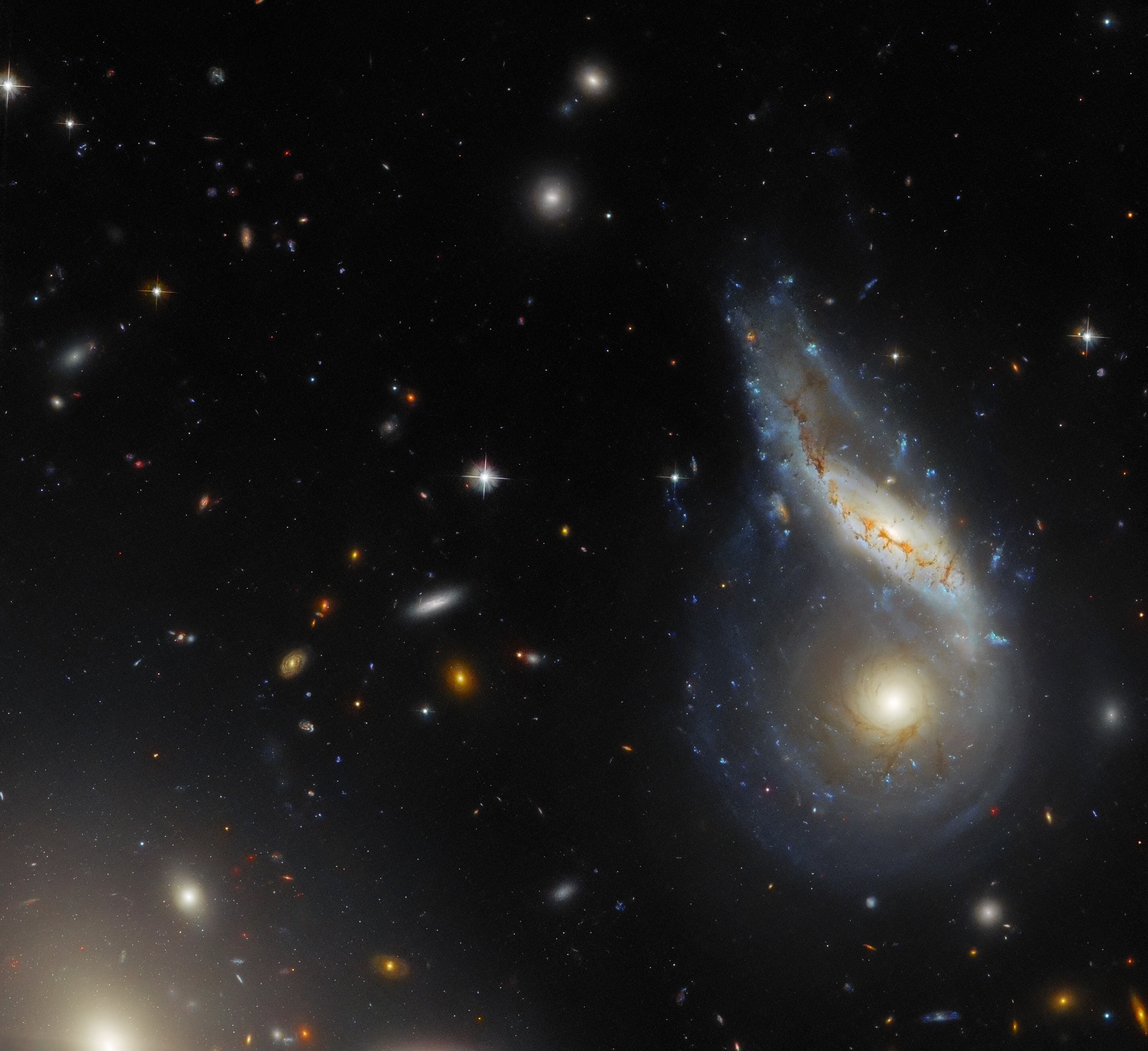 When one plus one (eventually) equals one -Credit: ESA/Hubble & NASA, J. Dalcanton, Dark Energy Survey/DOE/FNAL/DECam/CTIO/NOIRLab/NSF/AURA Acknowledgement: L. Shatz