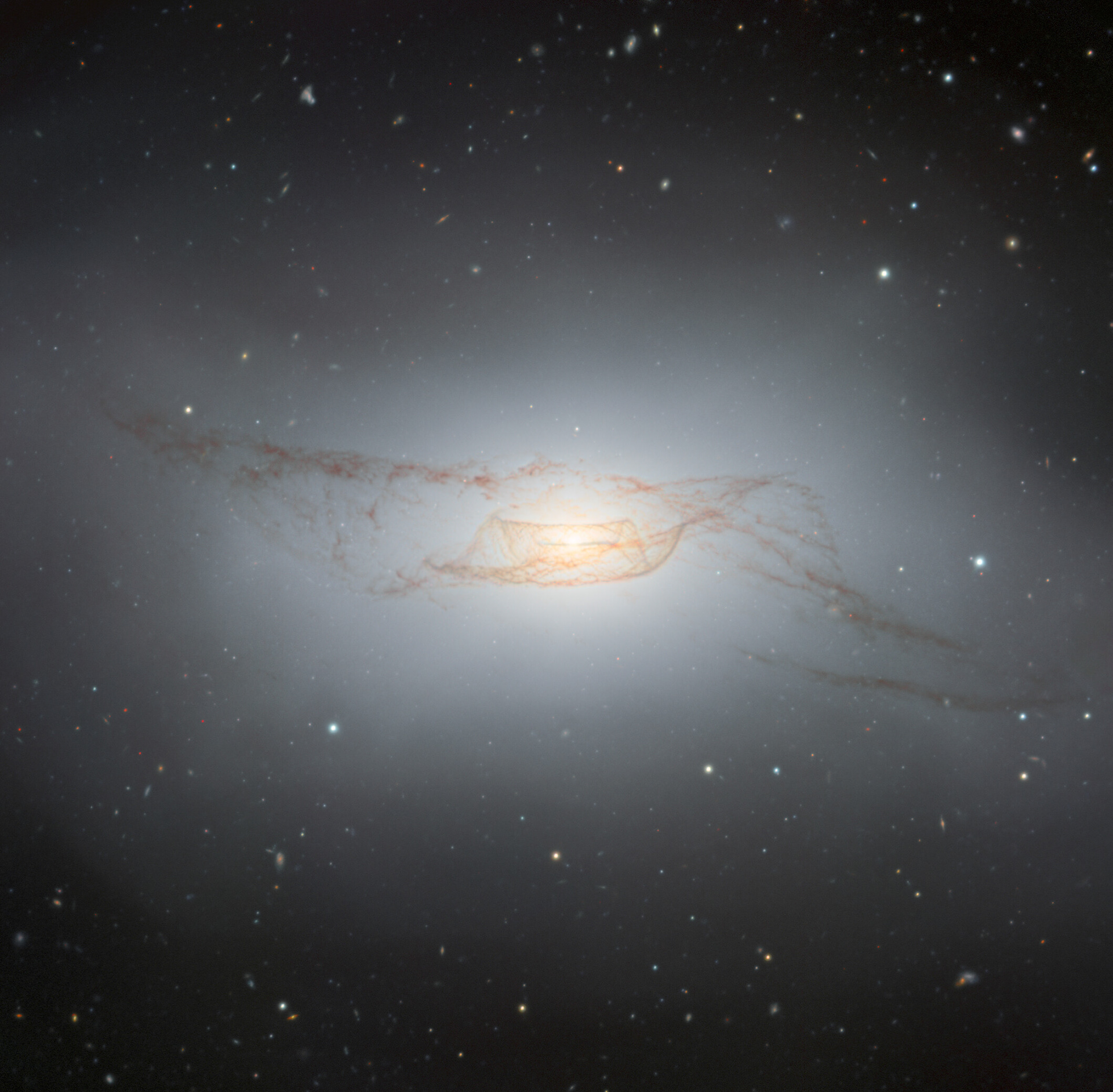 The Twisted Dusty Disk of NGC 4753- Credit: International Gemini Observatory/NOIRLab/NSF/AURA Image processing: J. Miller (International Gemini Observatory/NSF NOIRLab), M. Rodriguez (International Gemini Observatory/NSF NOIRLab), M. Zamani (NSF NOIRLab)
