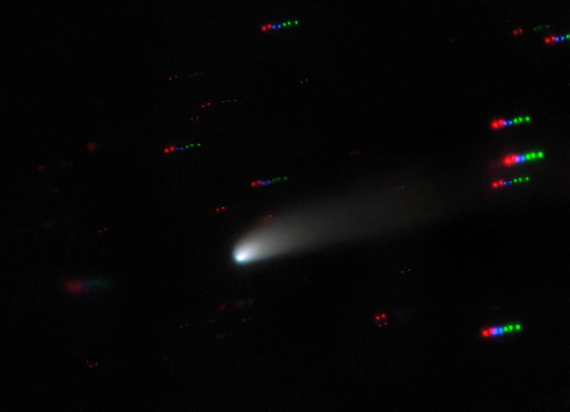 The blazing bright ball slicing through the center of this image is an example of a type of celestial body known as a centaur — a Solar System object that can be like both a comet and an asteroid. These fast moving icy objects reside in unstable orbits in the space between Jupiter and Neptune. The centaur in this image is named P/2019 LD2 (ATLAS), or LD2 for short. LD2 was observed from Gemini North, the Hawai‘i-based half of the international Gemini Observatory, which is a Program of NSF’s NOIRLab.   LD2 is on the cusp of an important transition — it is the first centaur to be seen in the process of changing into a comet-like state. It is slowly being nudged closer and closer towards the inner Solar System, which is causing its tail to form, and it is on track to move within Jupiter’s orbit in 2063. Once it does, it will cease to be a centaur, and will become a Jupiter Family Comet instead — joining a population of comets orbiting the Sun in less than 20 years and roughly in the same plane as most of the rest of the Solar System.  That astronomers are able to witness LD2’s transition is unique and it is particularly exciting as many astronomers will be able to observe this metamorphosis within their own lifetimes — a fascinating glimpse of astronomy in action.  Credit: International Gemini Observatory/NOIRLab/NSF/AURA  Acknowledgments: PI: C.Schambeau (University of Central Florida) Image Processing: Travis Rector (University of Alaska Anchorage), Mahdi Zamani & Davide de Martin