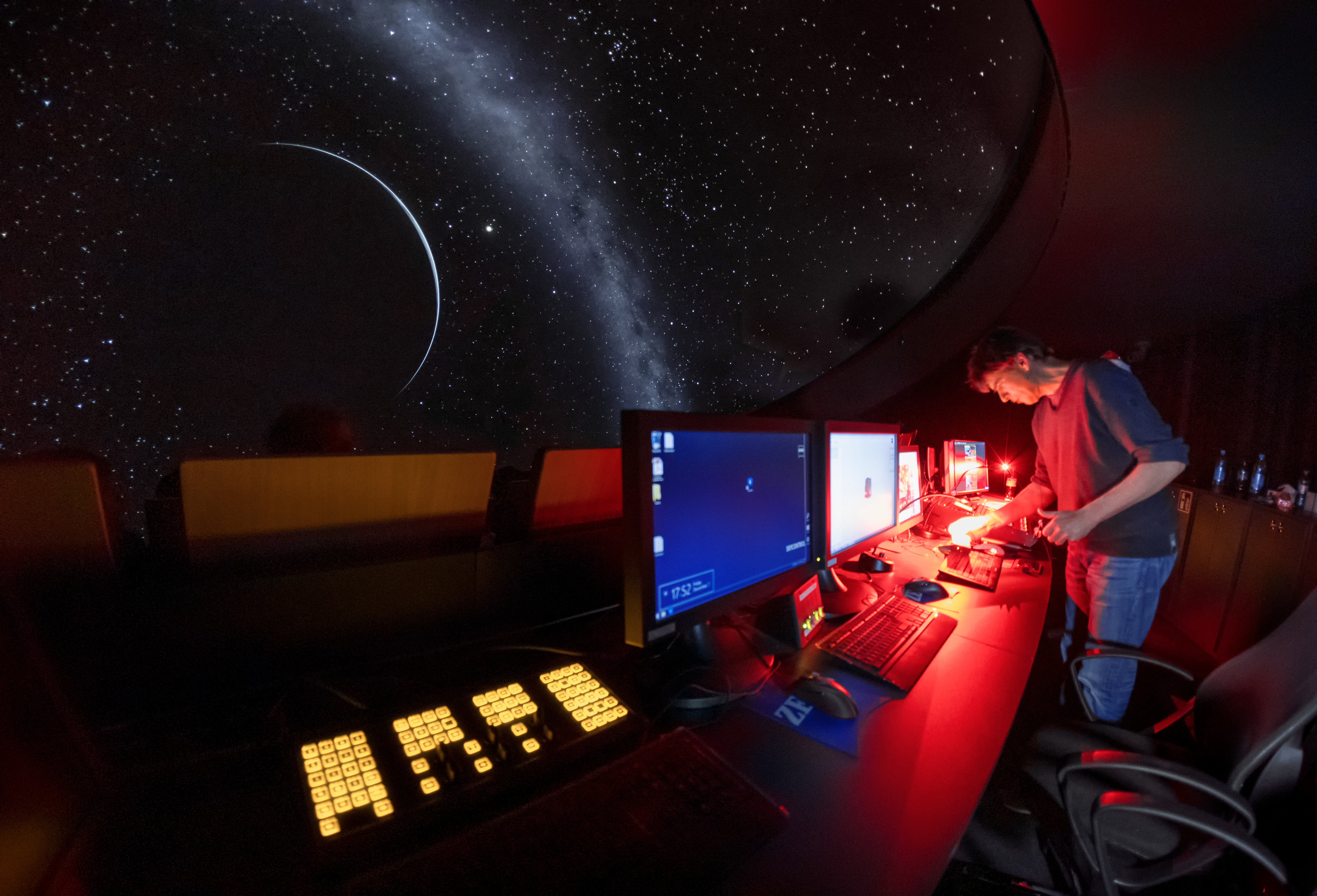 ESO staff preparing for a planetarium show.