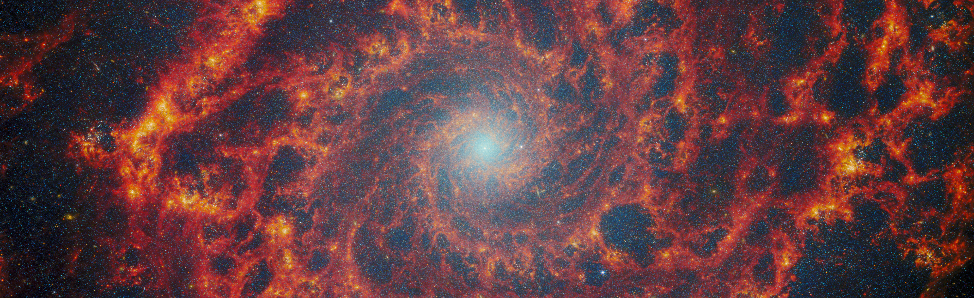 Catching the edge of the Phantom Galaxy - Credit: ESA/Webb, NASA & CSA, A. Adamo (Stockholm University) and the FEAST JWST team