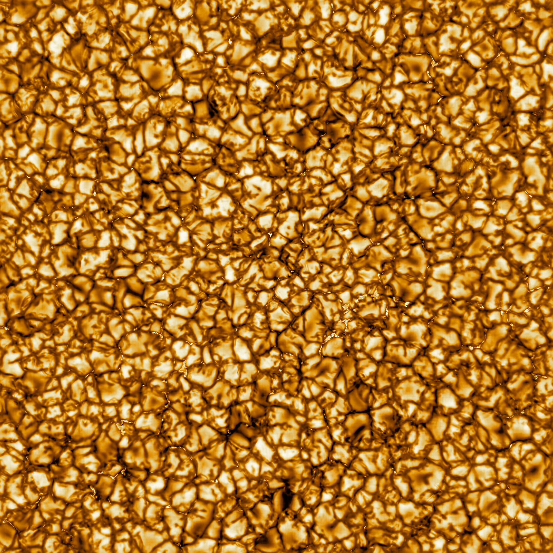 Caption: The Daniel K. Inouye Solar Telescope has produced the highest resolution image of the Sun’s surface ever taken. In this picture taken at 789nm, we can see features as small as 30km (18 miles) in size for the first time ever. The image shows a pattern of turbulent, “boiling” gas that covers the entire sun. The cell-like structures – each about the size of Texas – are the signature of violent motions that transport heat from the inside of the sun to its surface. Hot solar material (plasma) rises in the bright centers of “cells,” cools off and then sinks below the surface in dark lanes in a process known as convection. In these dark lanes we can also see the tiny, bright markers of magnetic fields. Never before seen to this clarity, these bright specks are thought to channel energy up into the outer layers of the solar atmosphere called the corona. These bright spots may be at the core of why the solar corona is more than a million degrees!  This image covers an area 36,500 × 36,500 km (22,600 × 22,600 miles or 51 × 51 arcseconds). Credit:  NSO/AURA/NSF