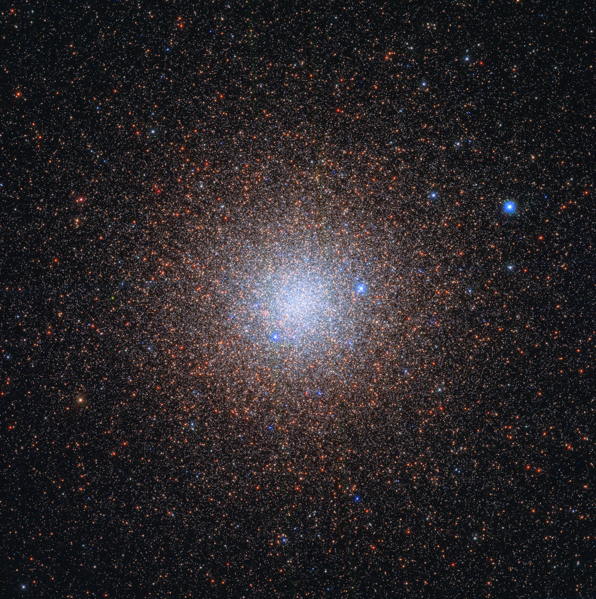 Stellar Snowflakes / Almost like snowflakes, the stars of the globular cluster NGC 6441 sparkle peacefully in the night sky, about 13 000 light-years from the Milky Way’s galactic centre. Like snowflakes, the exact number of stars in such a cluster is difficult to discern. It is estimated that together the stars weigh 1.6 million times the mass of the Sun, making NGC 6441 one of the most massive and luminous globular clusters in the Milky Way.   NGC 6441 is host to four pulsars that each complete a single rotation in a few milliseconds. Also hidden within this cluster is JaFu 2, a planetary nebula. Despite its name, this has little to do with planets. A phase in the evolution of intermediate-mass stars, planetary nebulae last  for only a few tens of thousands of years, the blink of an eye on astronomical timescales.   There are about 150 known globular clusters in the Milky Way. Globular clusters contain some of the first stars to be produced in a galaxy, but the details of their origins and evolution still elude astronomers.  Credit: ESA/Hubble & NASA, G. Piotto