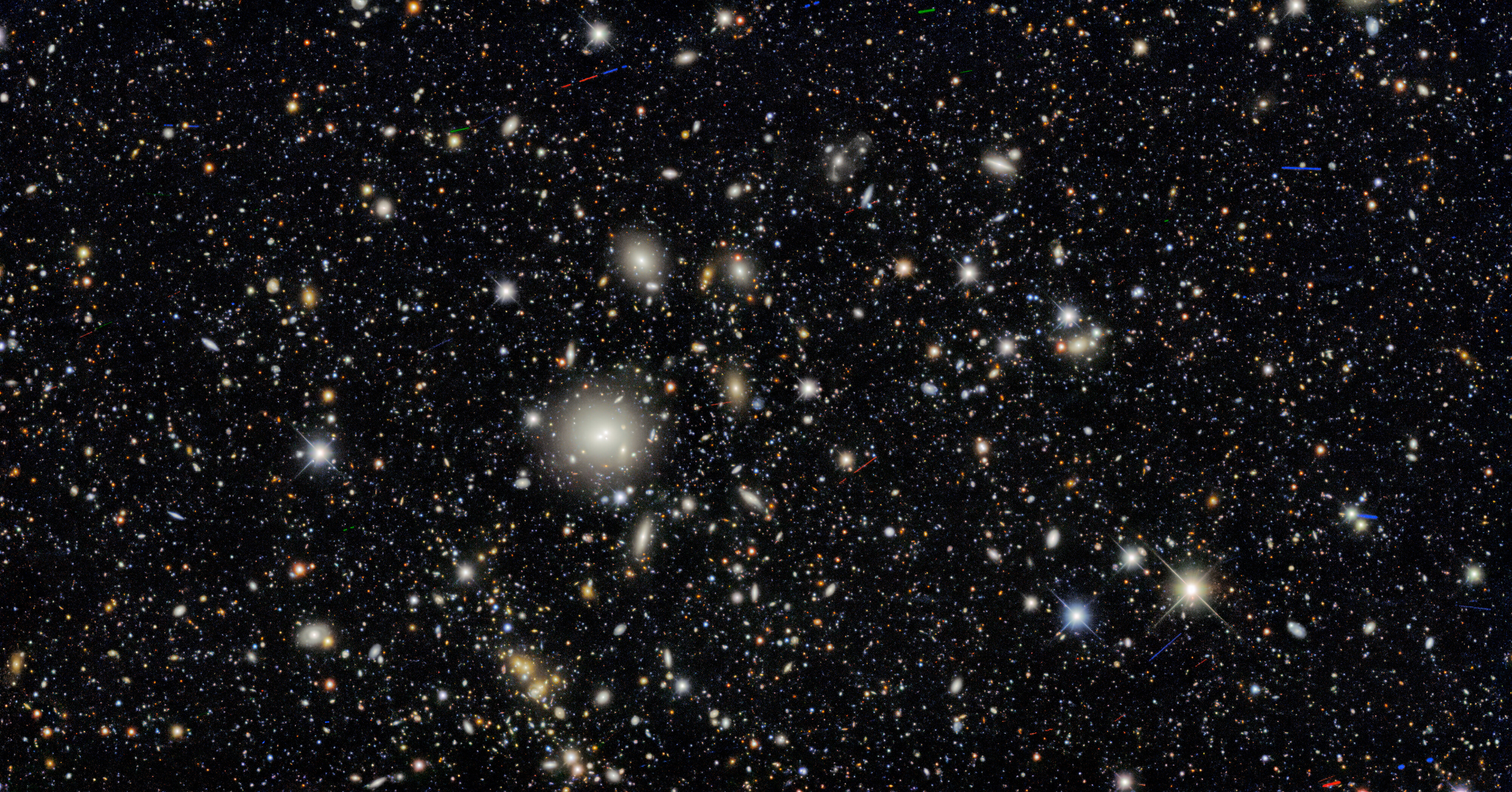 Ten areas in the sky were selected as “deep fields” that the Dark Energy Camera imaged several times during the survey, providing a glimpse of distant galaxies and helping determine their 3D distribution in the cosmos. The image is teeming with galaxies — in fact, nearly every single object in this image is a galaxy. Some exceptions include a couple of dozen asteroids as well as a few handfuls of foreground stars in our own Milky Way.  Credit: Dark Energy Survey/DOE/FNAL/DECam/CTIO/NOIRLab/NSF/AURA Acknowledgments: T.A. Rector (University of Alaska Anchorage/NSF’s NOIRLab), M. Zamani (NSF’s NOIRLab) & D. de Martin (NSF’s NOIRLab)