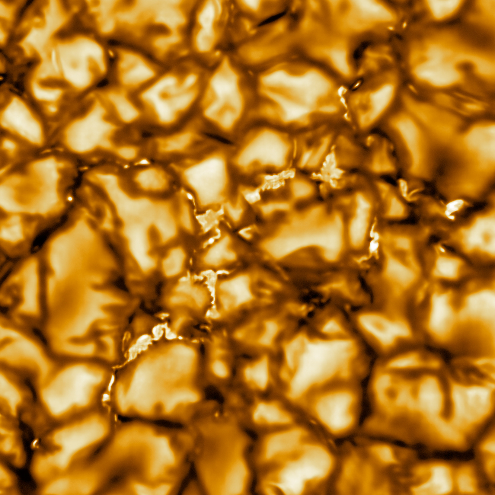 Caption: The Daniel K. Inouye Solar Telescope has produced the highest resolution image of the Sun’s surface ever taken. In this picture taken at 789nm, we can see features as small as 30km (18 miles) in size for the first time ever. The image shows a pattern of turbulent, “boiling” gas that covers the entire sun. The cell-like structures – each about the size of Texas – are the signature of violent motions that transport heat from the inside of the sun to its surface. Hot solar material (plasma) rises in the bright centers of “cells,” cools off and then sinks below the surface in dark lanes in a process known as convection. In these dark lanes we can also see the tiny, bright markers of magnetic fields. Never before seen to this clarity, these bright specks are thought to channel energy up into the outer layers of the solar atmosphere called the corona. These bright spots may be at the core of why the solar corona is more than a million degrees!  This image covers an area 8,200 × 8,200 km (5,000 × 5,000 miles, 11 × 11 arcseconds). Credit:  NSO/AURA/NSF
