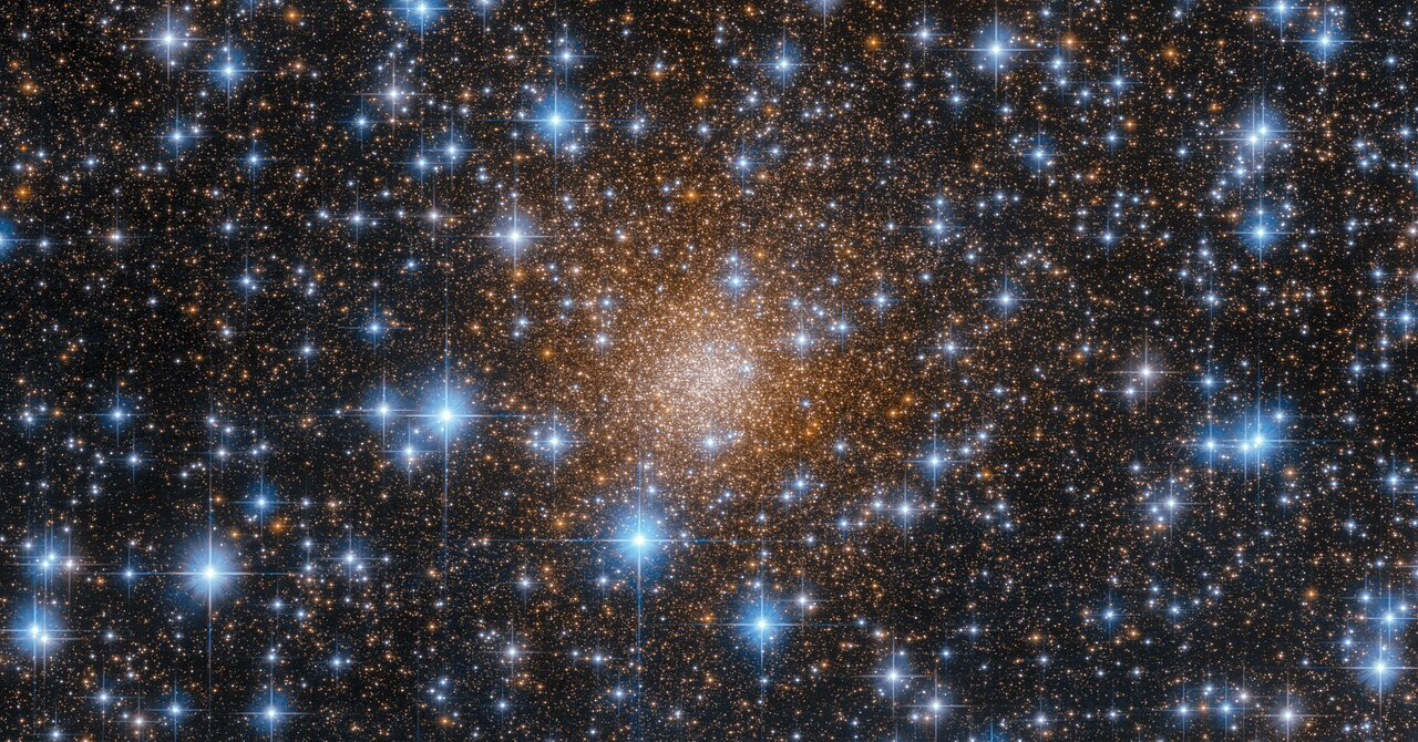 The muted red tones of the globular cluster Liller 1 are partially obscured in this image by a dense scattering of piercingly blue stars. In fact, it is thanks to Hubble’s Wide Field Camera 3 (WFC3) that we are able to see Liller 1 so clearly in this image, because the WFC3 is sensitive to wavelengths of light that the human eye cannot detect. Liller 1 is only 30 000 light-years from Earth — relatively neighbourly in astronomical terms — but it lies within the Milky Way’s ‘bulge’, the dense and dusty region at our galaxy’s centre. Because of that, Liller 1 is heavily obscured from view by interstellar dust, which scatters visible light (particularly blue light) very effectively. Fortunately, some infrared and red visible light are able to pass through these dusty regions. WFC3 is sensitive to both visible and near-infrared (infrared that is close to the visible) wavelengths, allowing us to see through the obscuring clouds of dust, and providing this spectacular view of Liller 1.   Liller 1 is a particularly interesting globular cluster, because unlike most of its kind, it contains a mix of very young and very old stars. Globular clusters typically house only old stars, some nearly as old as the Universe itself. Liller1 instead contains at least two distinct stellar populations with remarkably different ages: the oldest one is 12 billion years old and the youngest component is just 1-2 billion years old. This led astronomers to conclude that this stellar system was able to form stars over an extraordinary long period of time.   Links Video of A Hiding in Plain Sight Credit: ESA/Hubble & NASA, F. Ferraro