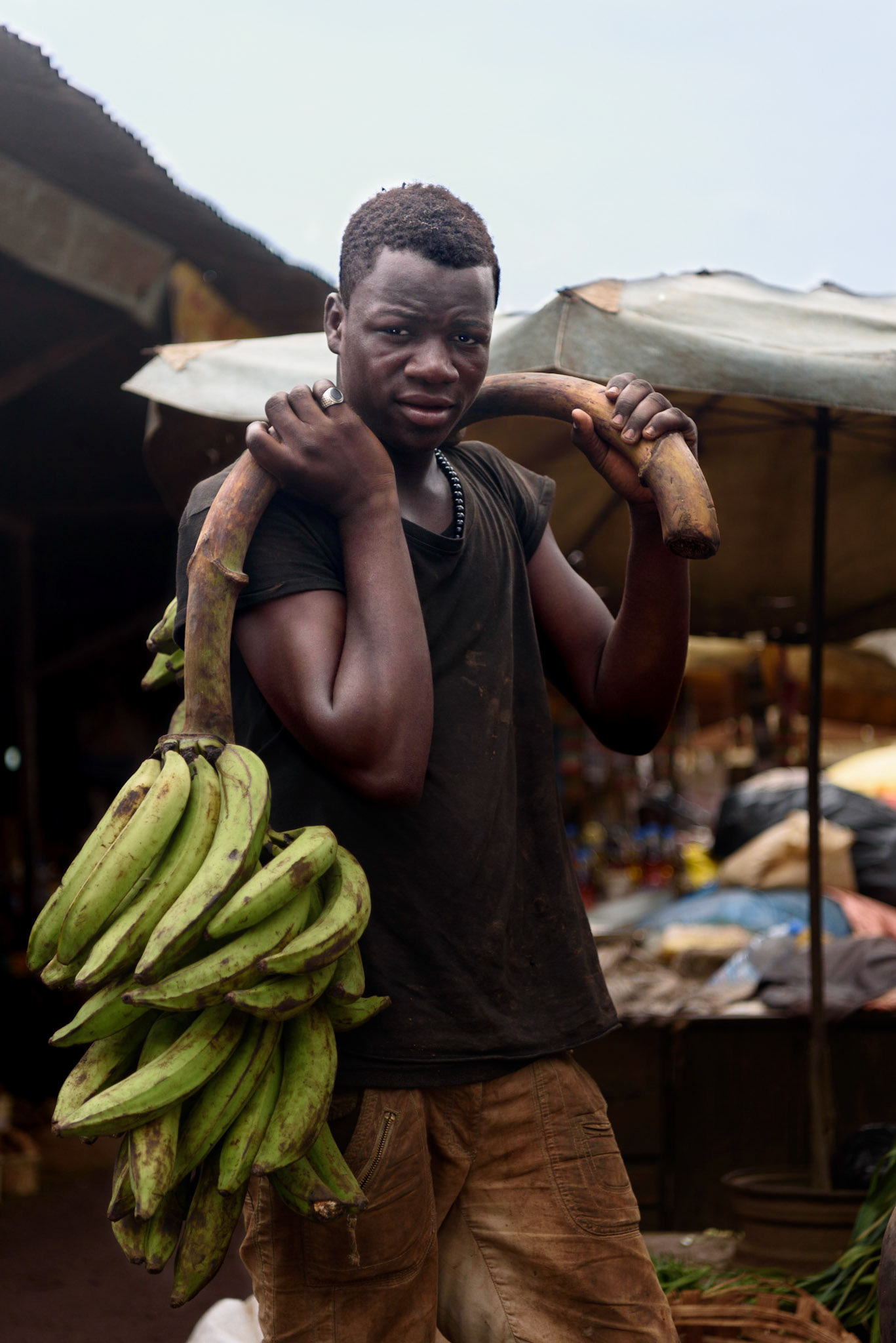 Market series with Mathieu a 17yo carrier in the Sandaga market in Douala Cameroon