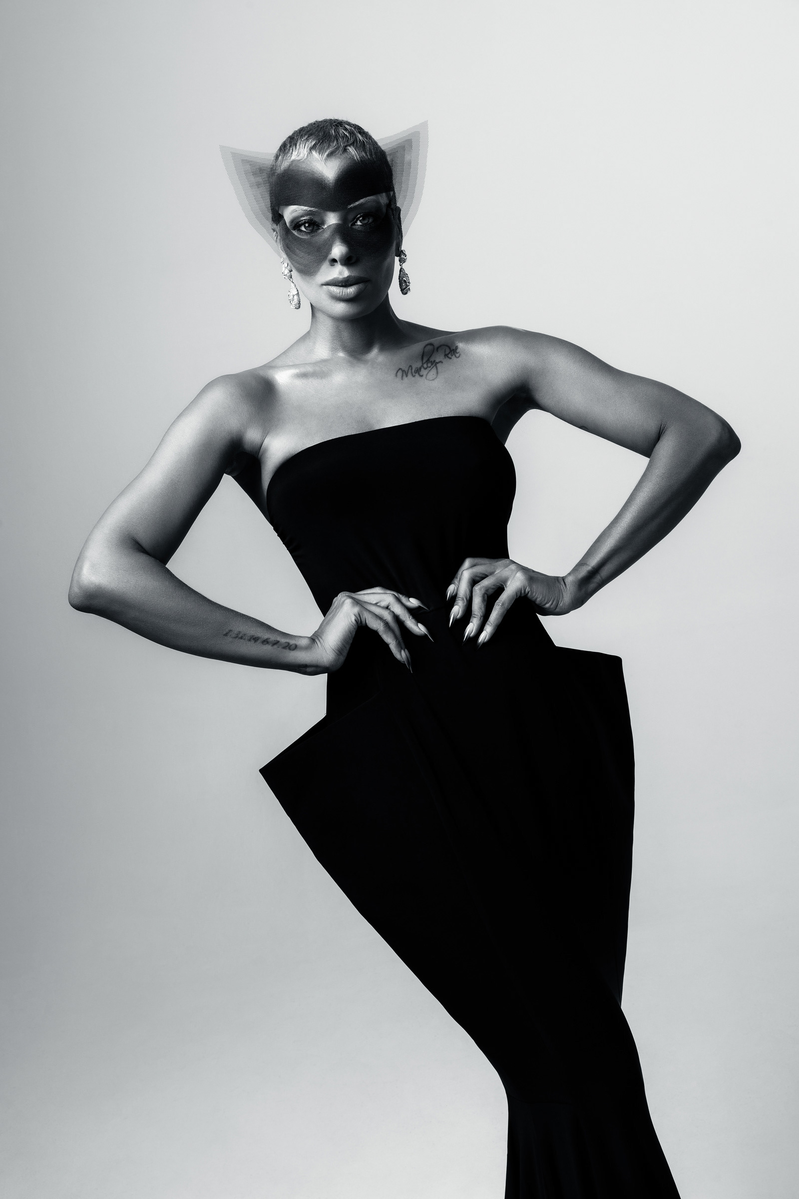 Eva Marcille · Sculptural black gown