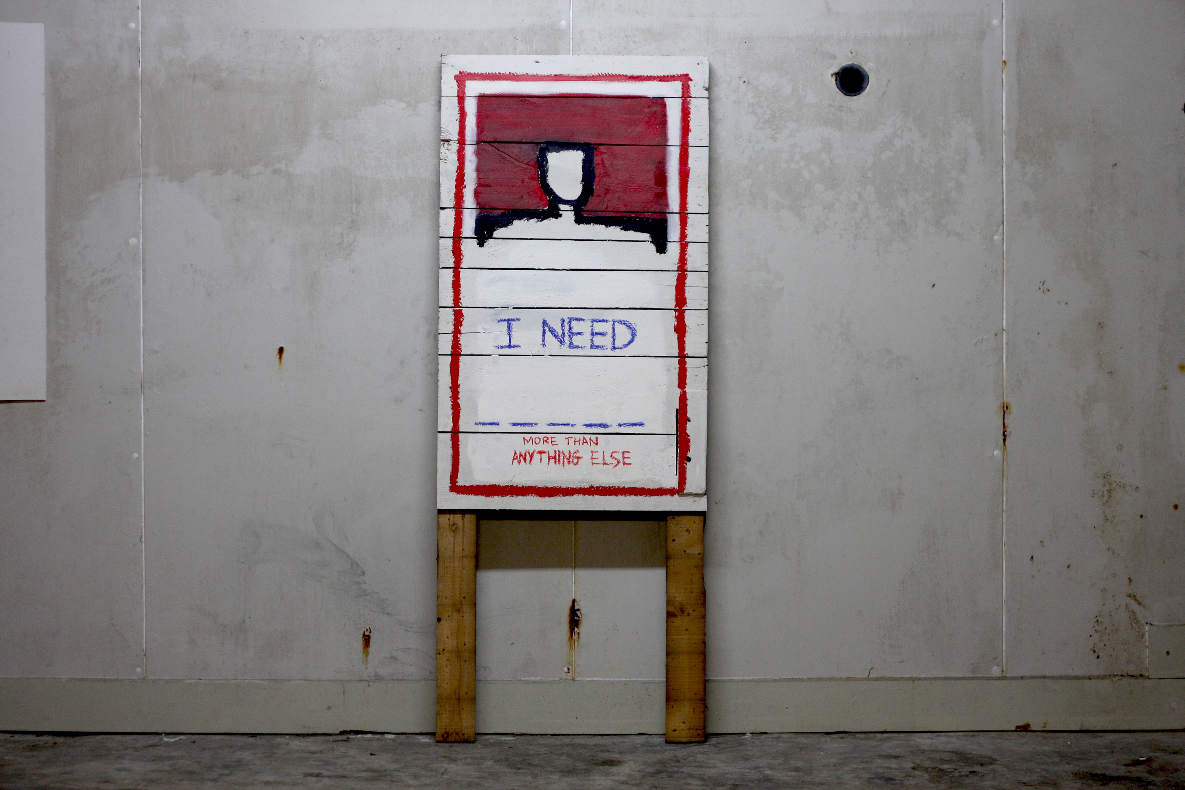 I NEED _____ (2017), OILSTICK, ACRYLIC, HOUSEHOLD GLOSS, WAX ON WOODEN PANEL