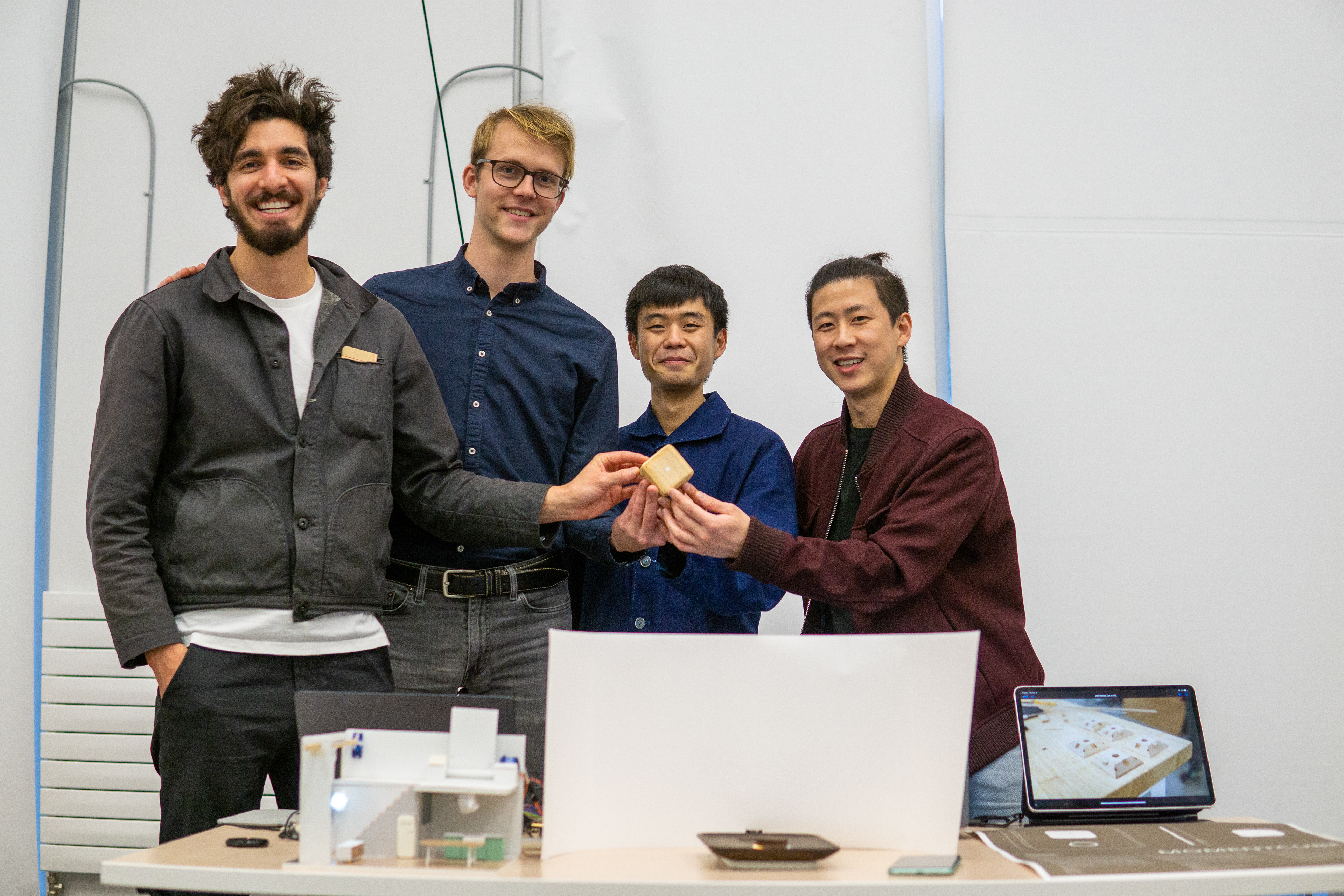 Our team showing off our beautiful cube!
