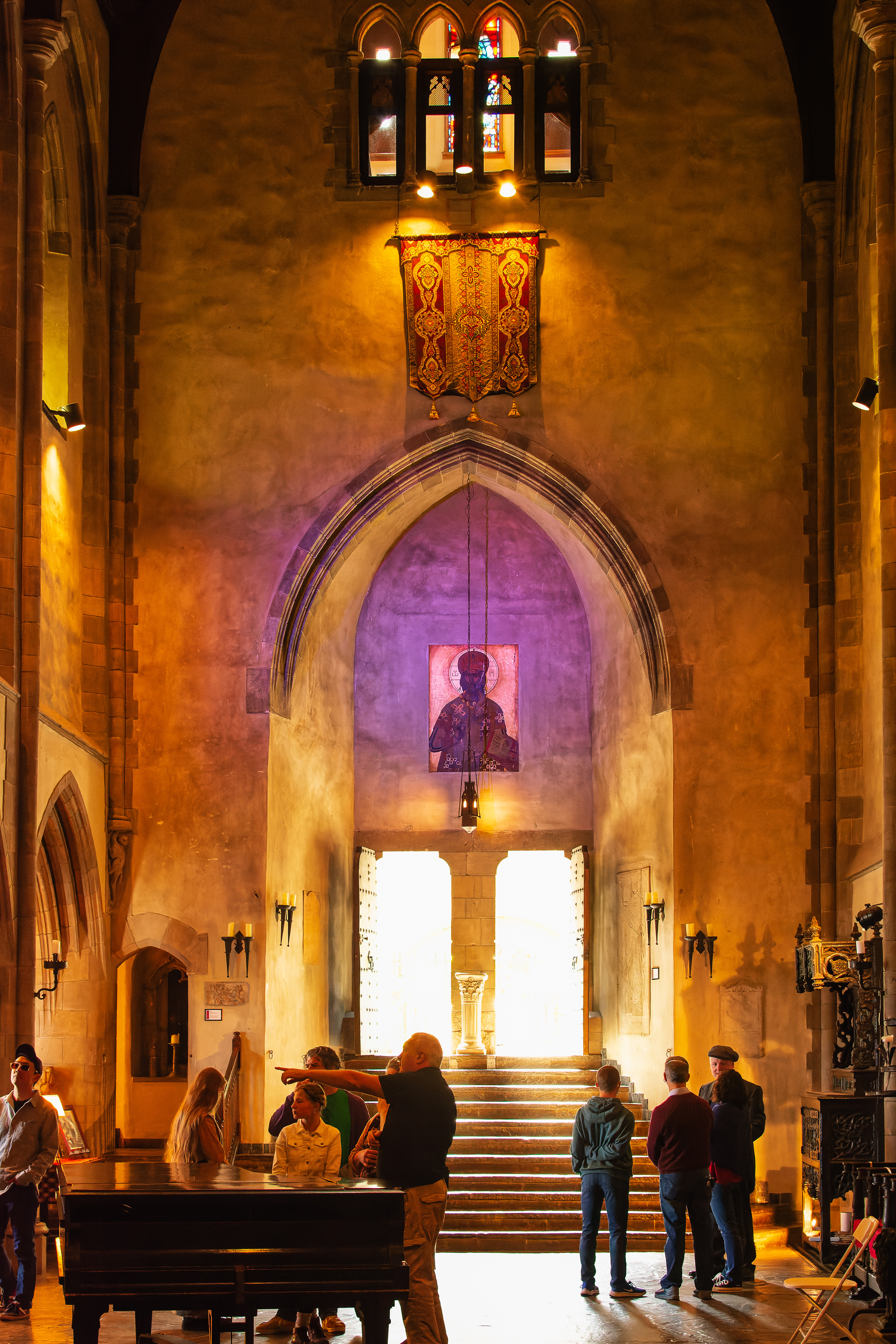 The massive entrance to the religious themed great room with visitors admiring the sites