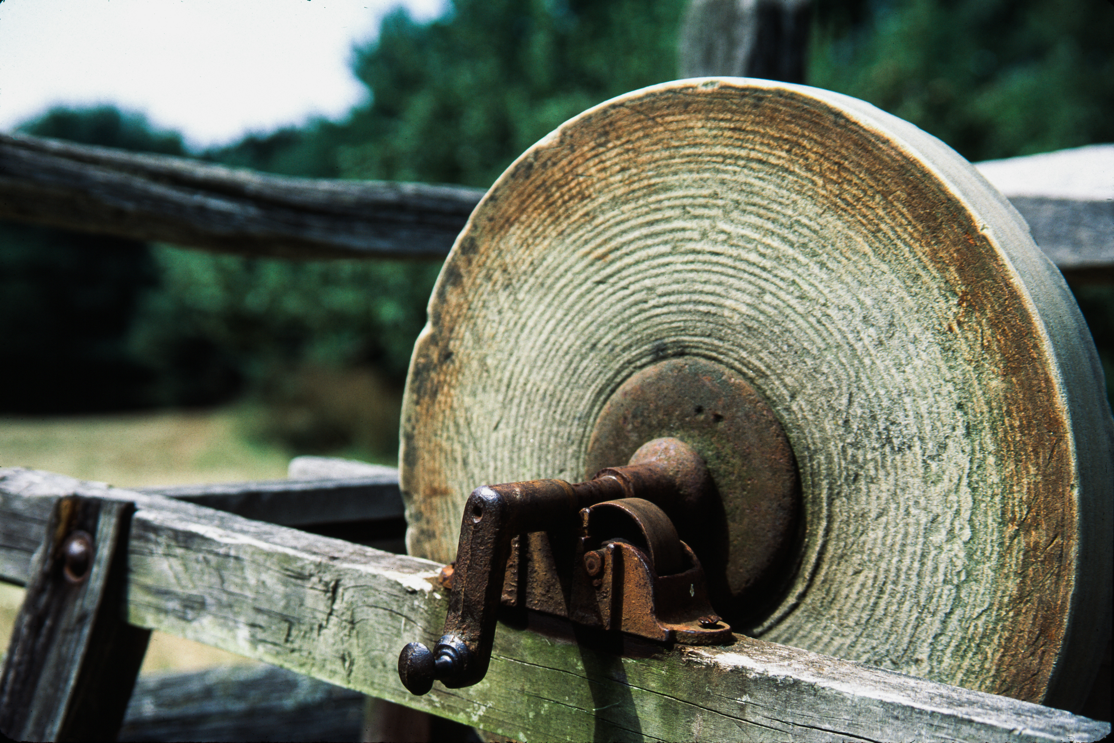 A vintage hand cranked sharpening stone