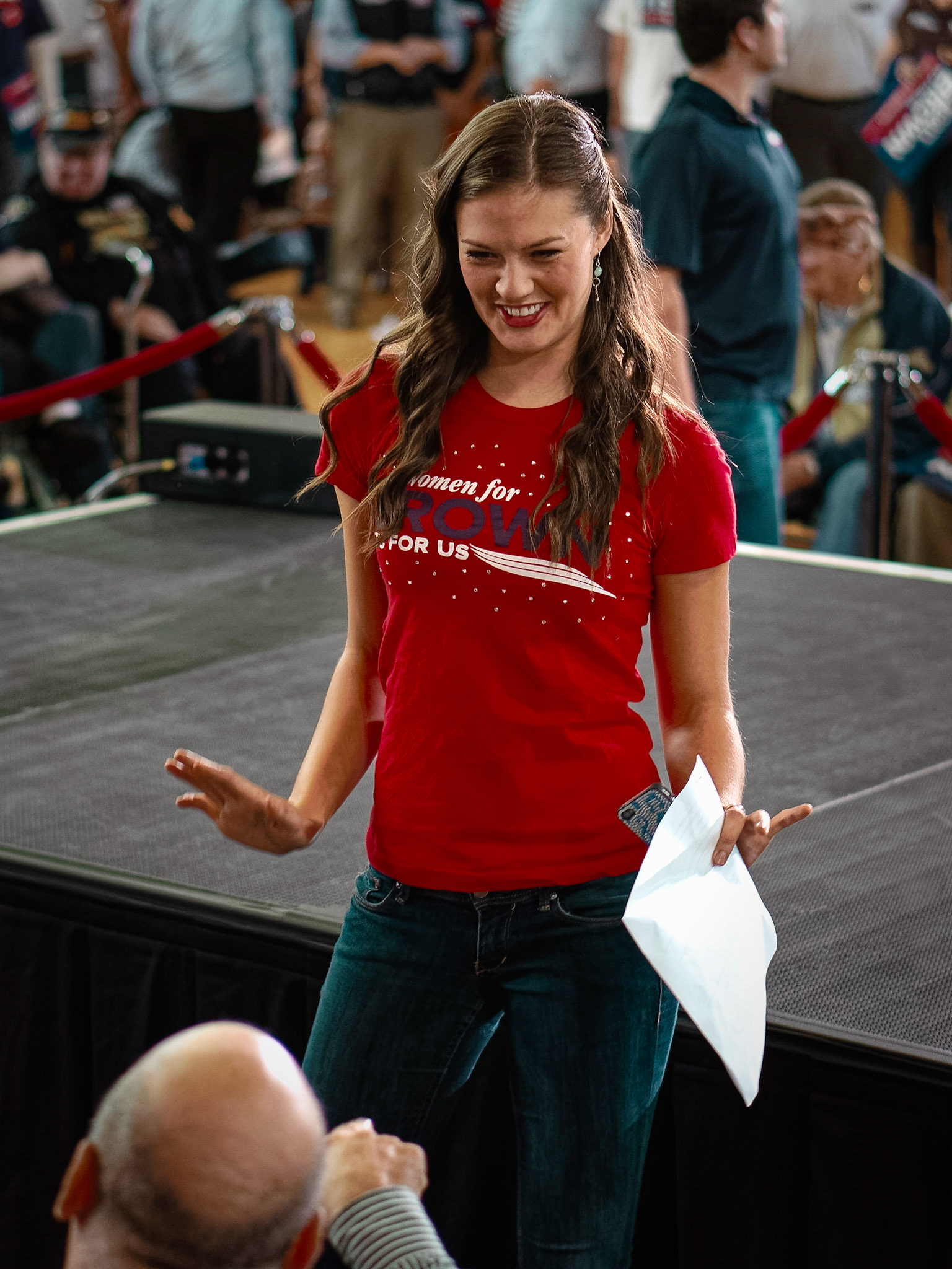Ayla Brown speaks with a fan in support of her father Scott Brown's run for Senate at a rally in Melrose, Massachusetts.