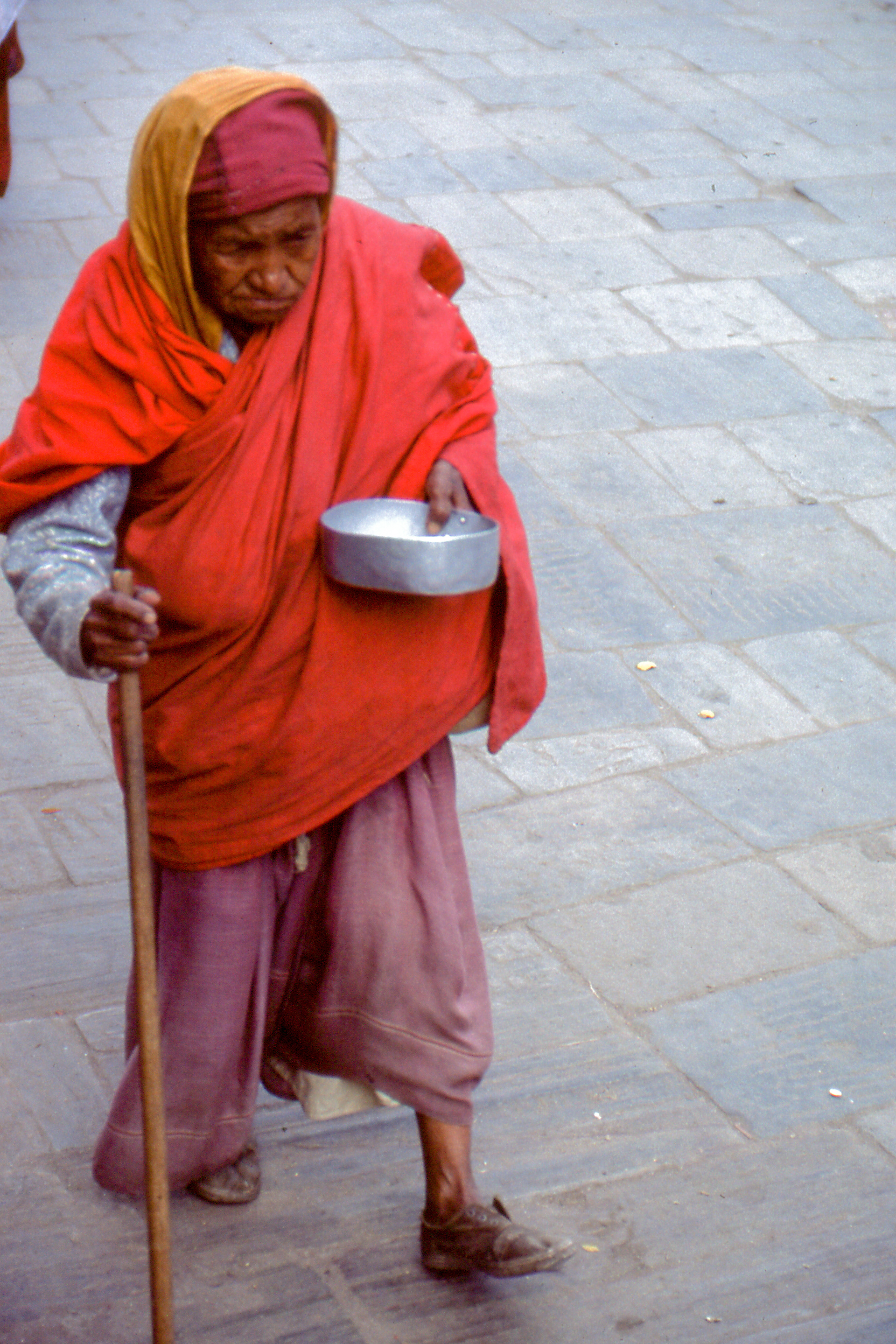 nun asking for alms