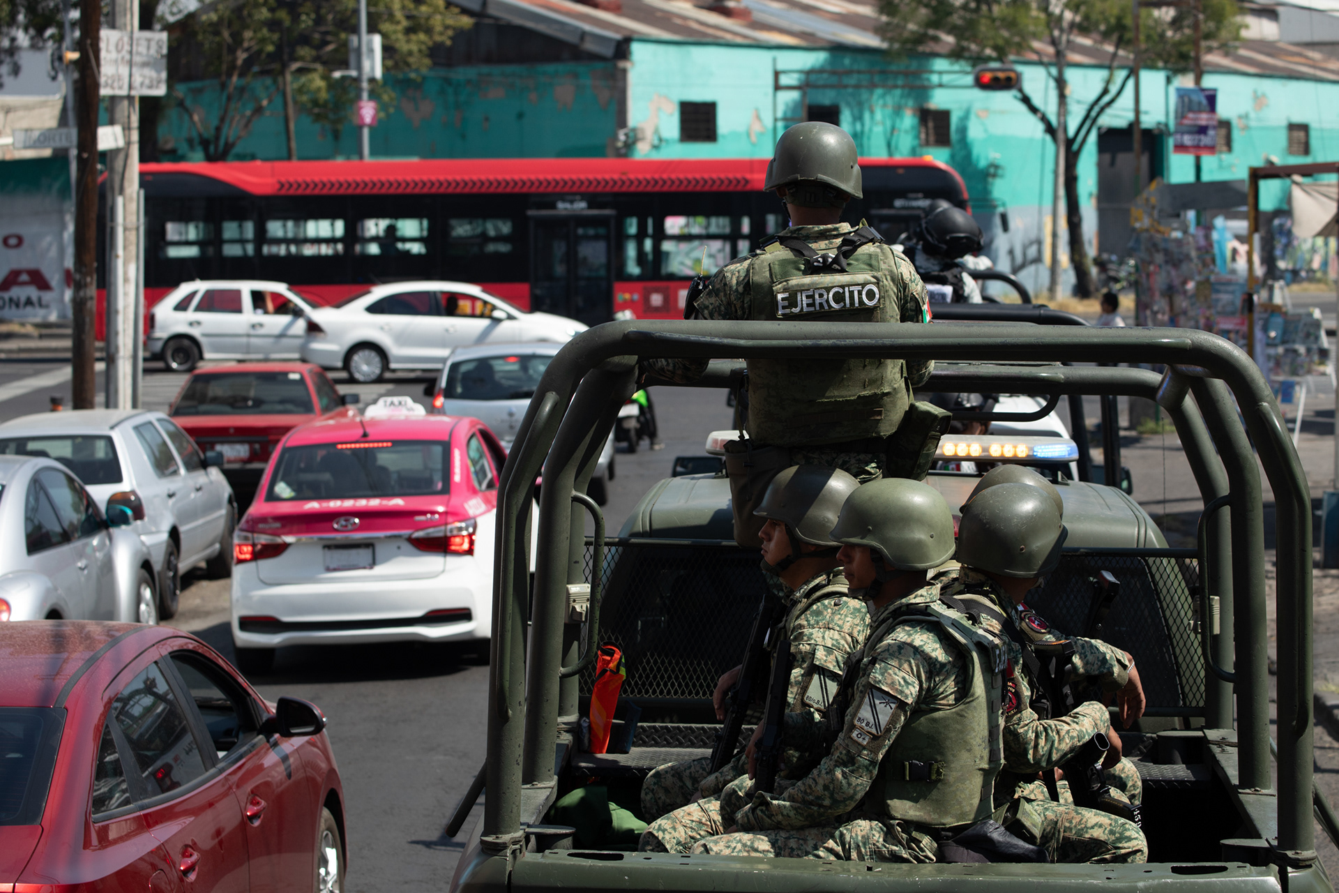 Members of SEDENA (Secretaría de la Defensa Nacional) and the Mexican National Guard (Guardia Nacional, GN) conduct a joint patrol in the streets of the Venustiano Carranza borough of Mexico City. The operation focused on monitoring criminal activity and drug trafficking in the area, which includes the city's international airport. 2025