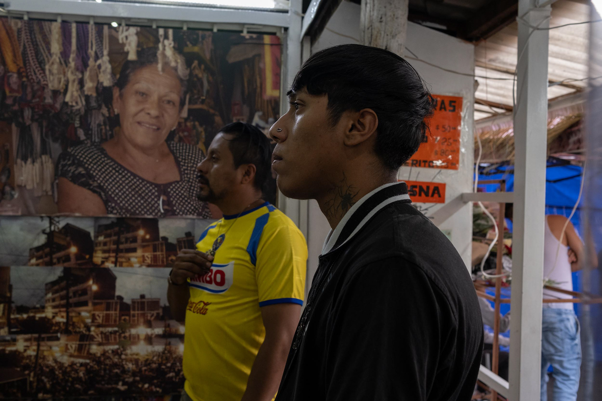 Devotees of Santa Muerte pray at the altar in Tepito, Mexico City.