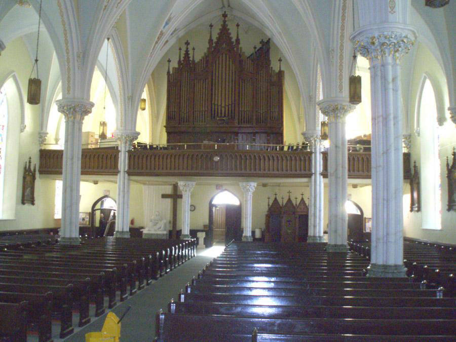 Marble and Gilded Columns in Church by Robert Ireland Studios