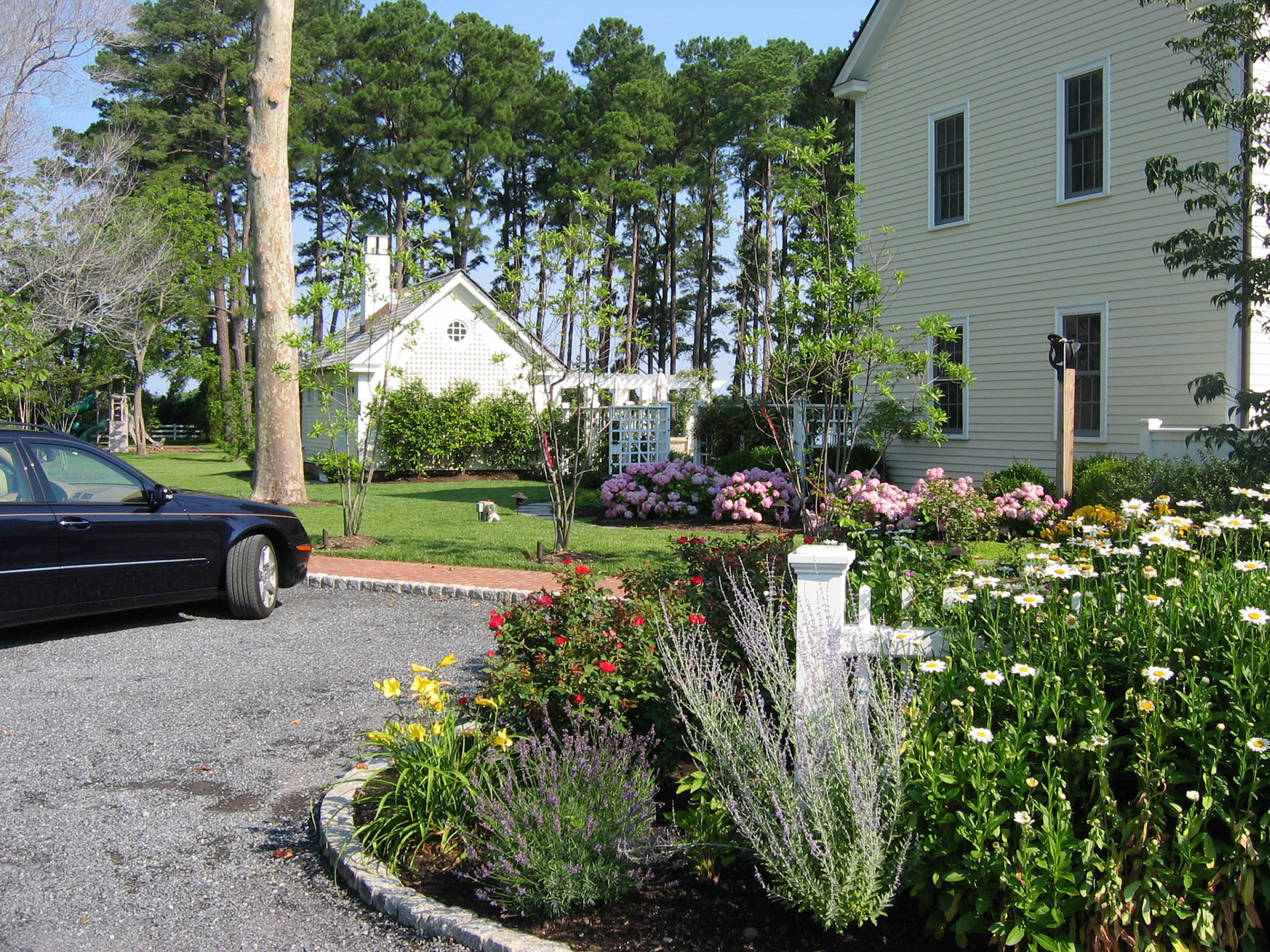 The driveway pull off is located where the clients typically come and go during their daily routine.  The design here, a part of the front entry garden, creates a pleasant sense of arrival.