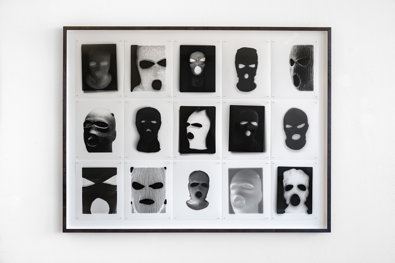 15 framed photographs of terror Masks for the incite collection