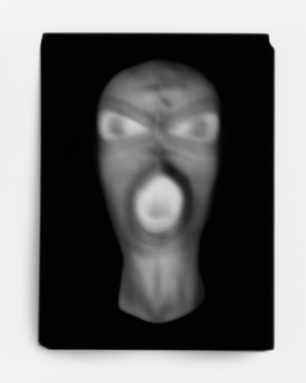 contact printed photograph of a terrorist ski mask made using an iPad in the darkroom