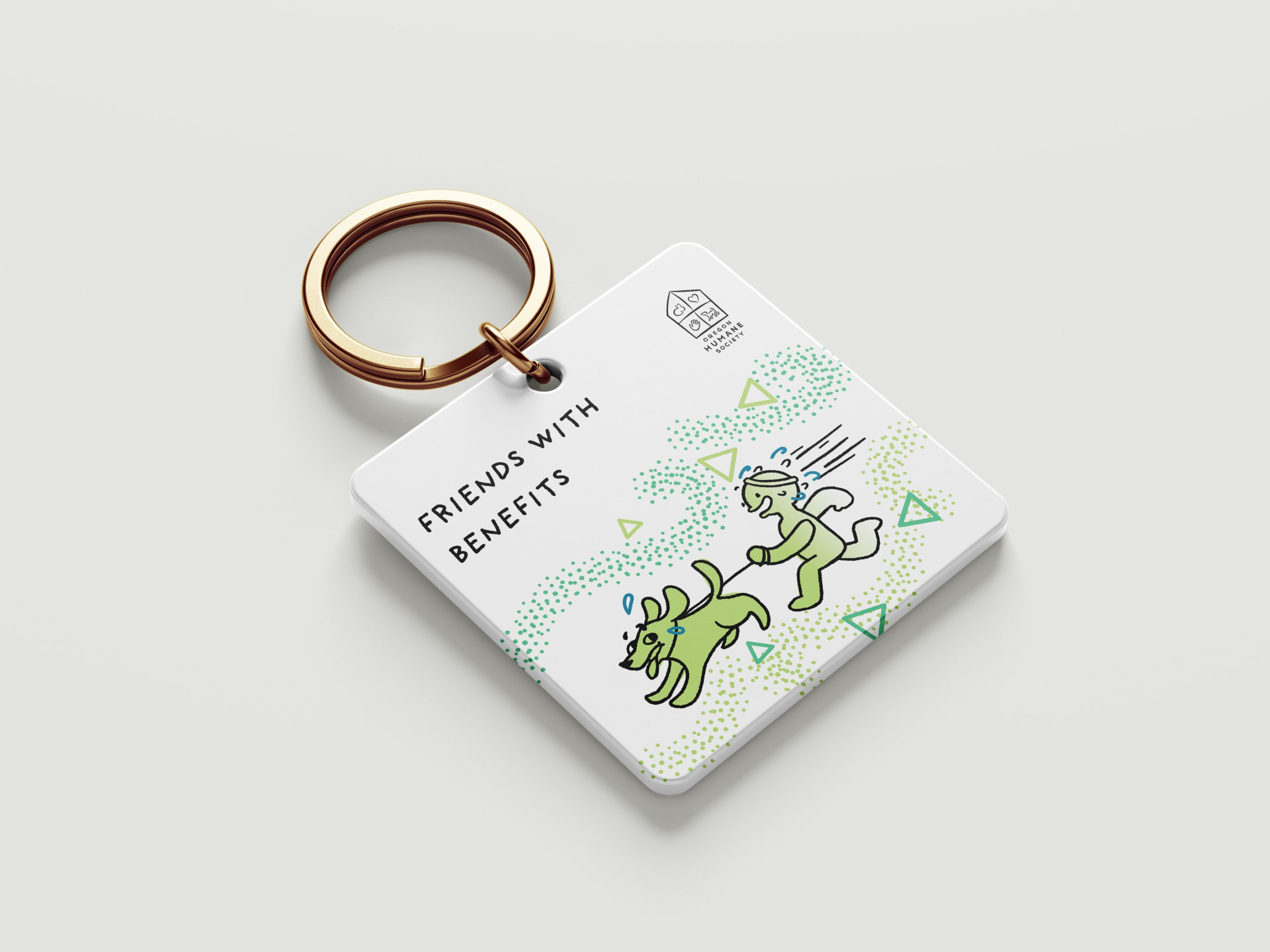 "Friends with Benefits" dog adoption keychain mockup.