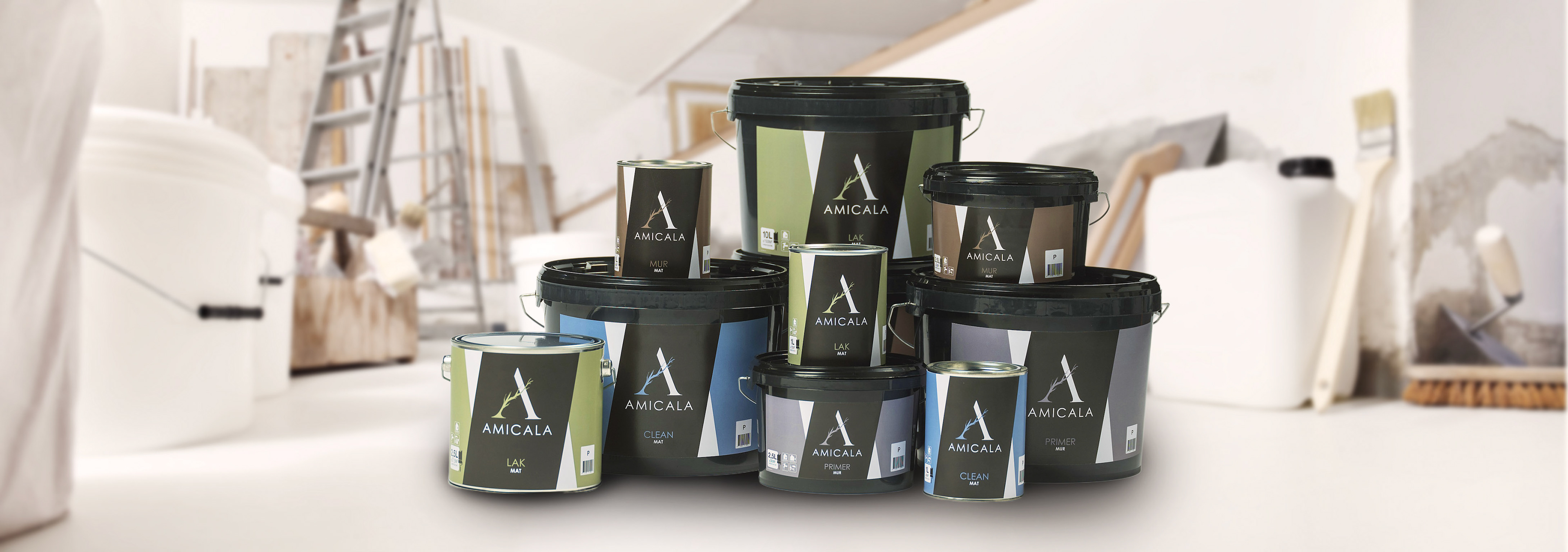 Low angle of indoor shot of construction or building site of home renovation with tools on white floor with paint buckets and primer jerry can
