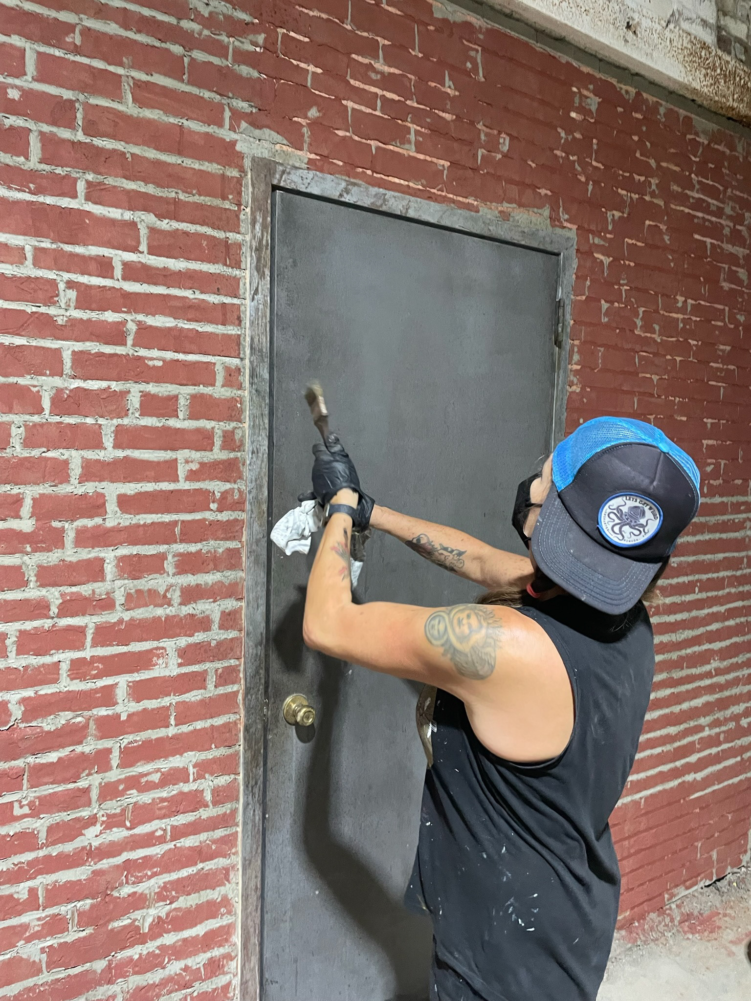 working on set, aging door frame NBC Universal