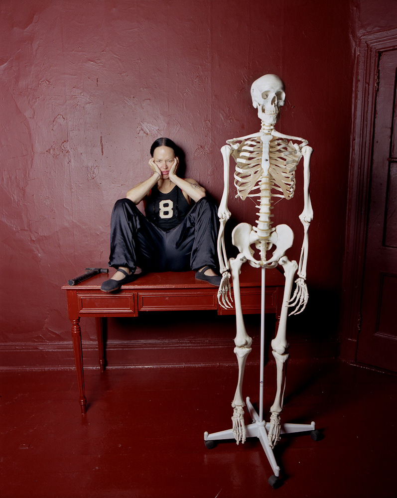 Kembra Pfahler with a hammer and a skeleton, NYC