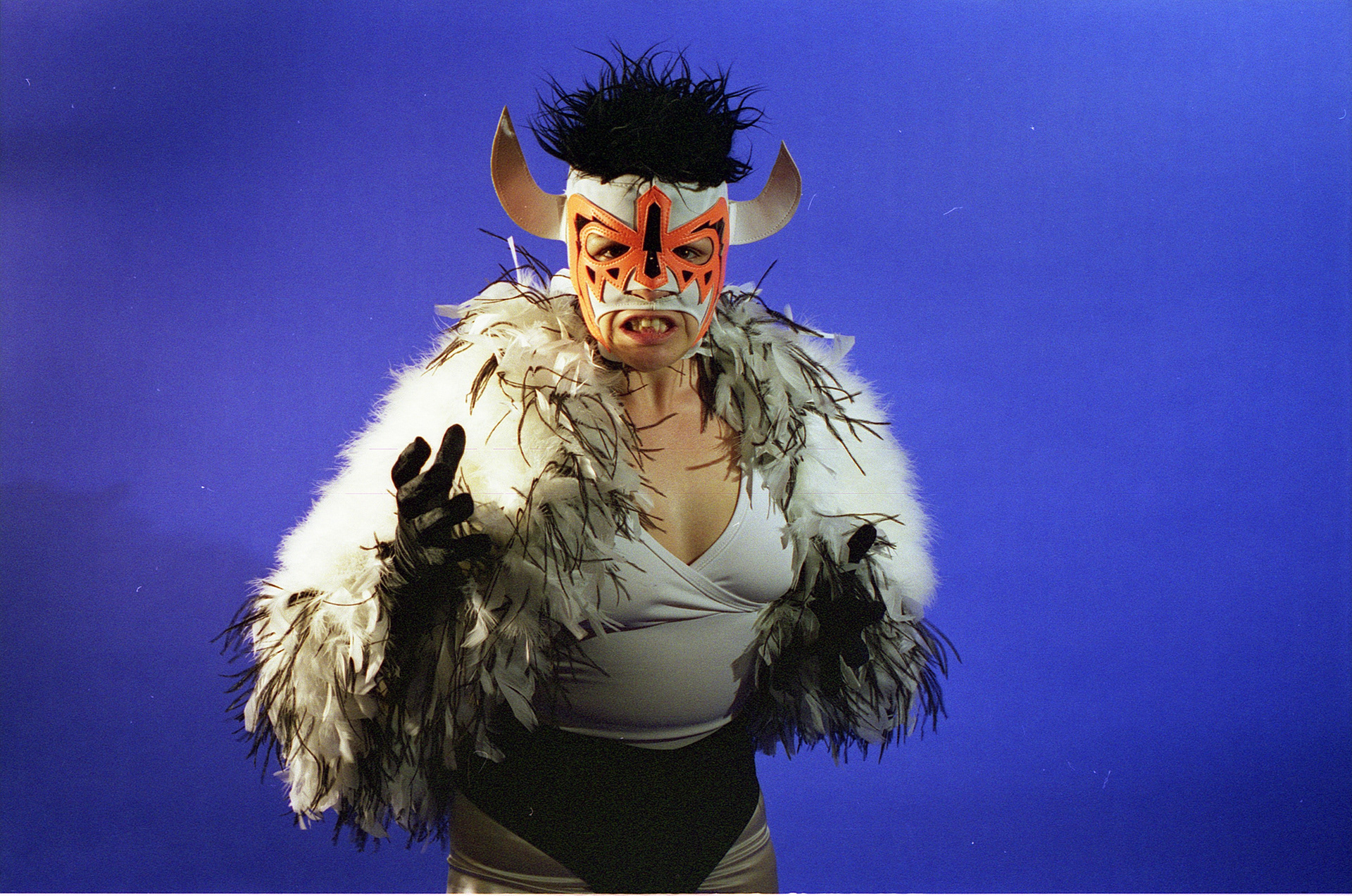 Michelley Queen of Queens in a wrestling mask