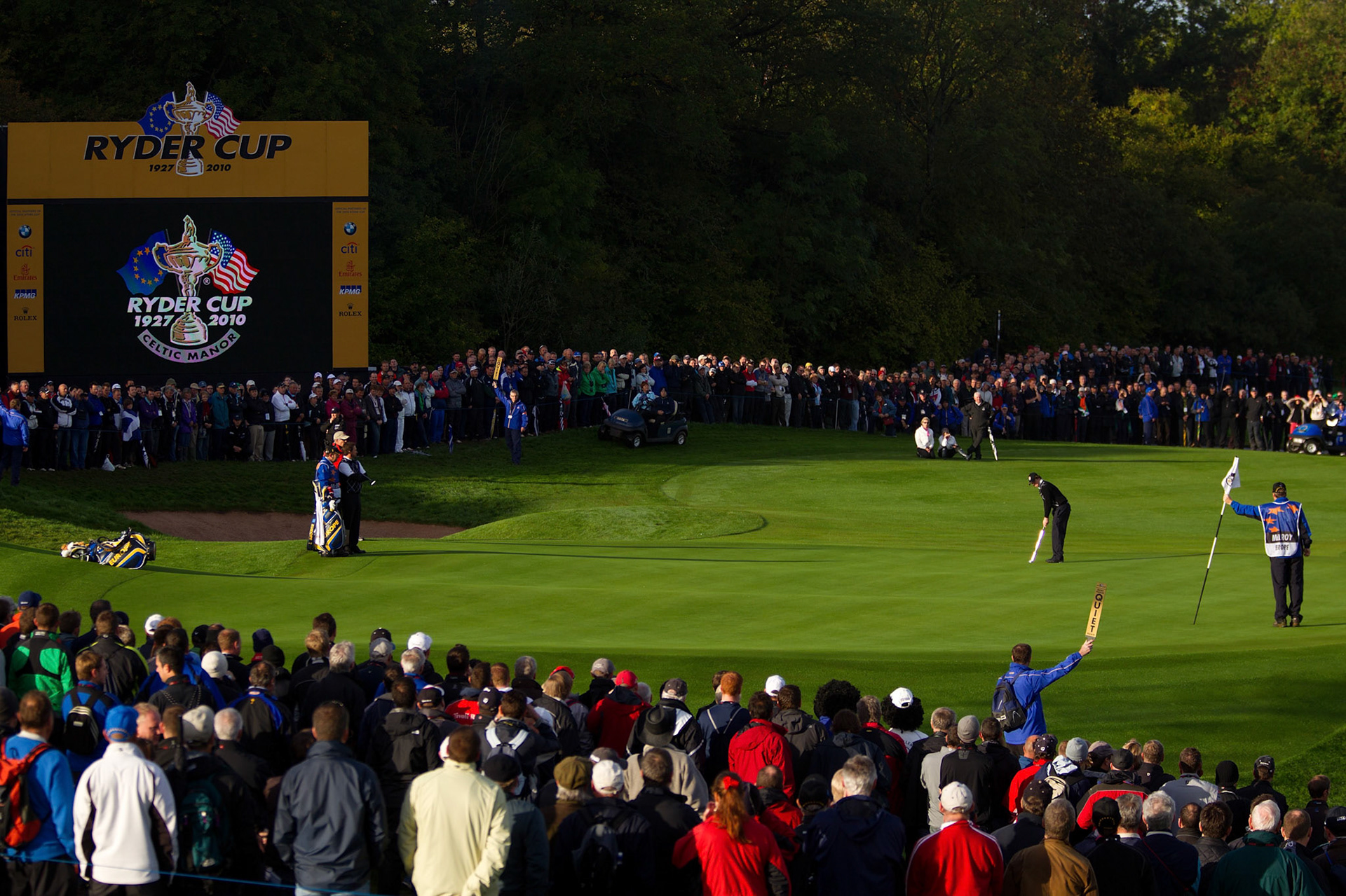 Rory McIlroy sets up for his putt on the 14th green during the 38th Ryder Cup at Celtic Manor Resort. (Photo by ALLAN HENRY / GOLF CHRONICLES)