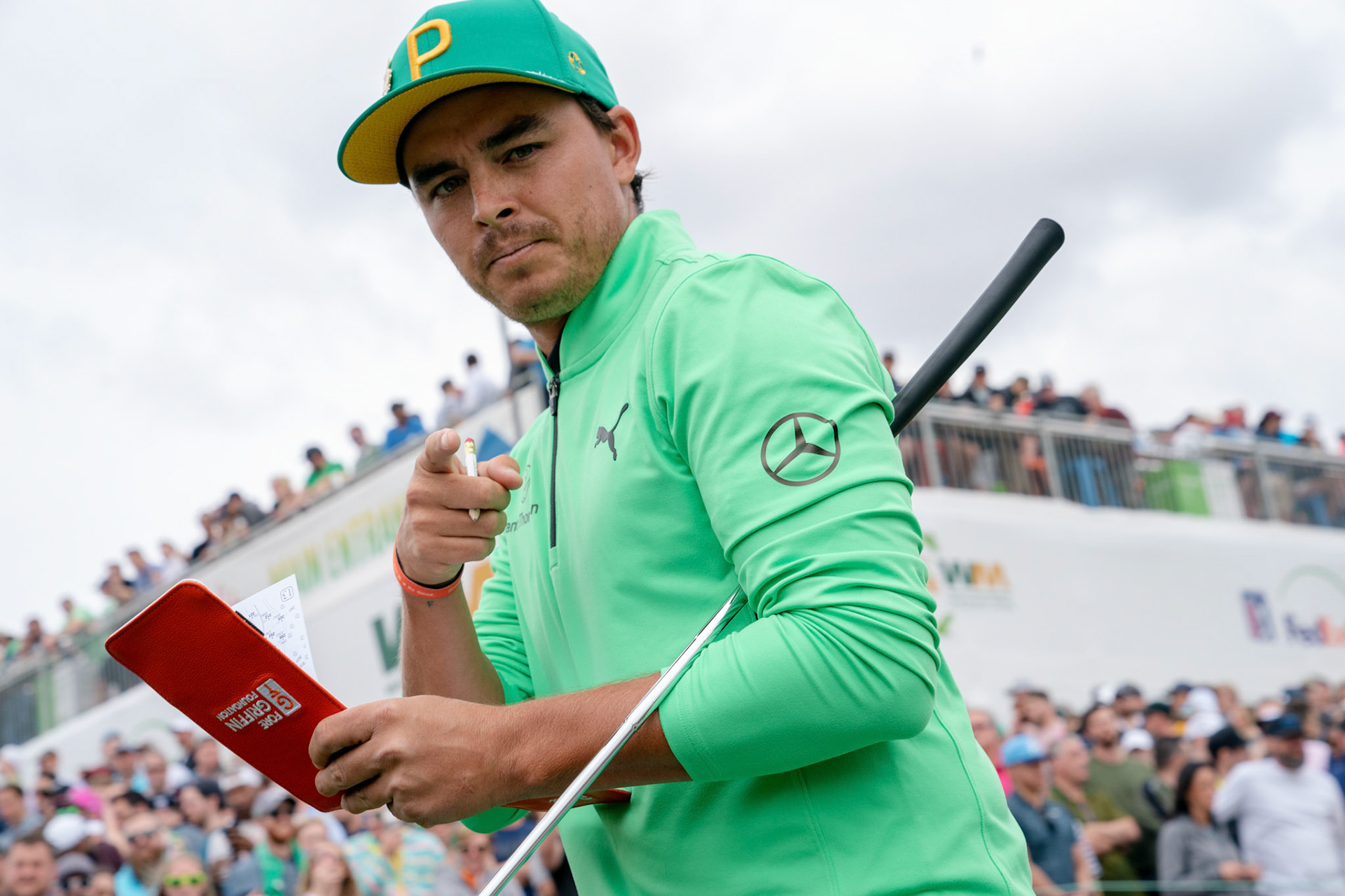 Feb 2, 2019; Scottsdale, AZ, USA; Rickie Fowler reacts while been photographed after finishing the 12th hole during the third round of the Waste Management Phoenix Open golf tournament at TPC Scottsdale. Mandatory Credit: Allan Henry-USA TODAY Sports