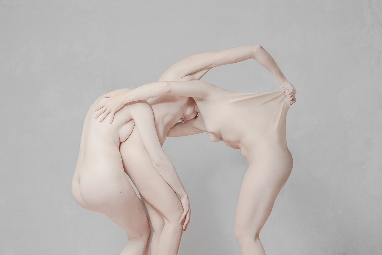 Weakness of the Flesh/2021. Figurative fine-art photography by Viktoria Andreeva.Drawing inspiration from the complexities of human connection and interaction, the project delves into the role of the individual within society. It examines how we connect, transform, and continuously reshape our collective experiences, often overlooking the impact we have on each other and our surroundings. Throughout this project, I wanted to capture the moments when bodies transform and merge into a single organism, then fragment and rebuild once again. I saw this process as a reflection of the fluid and evolving dynamics of human behavior.