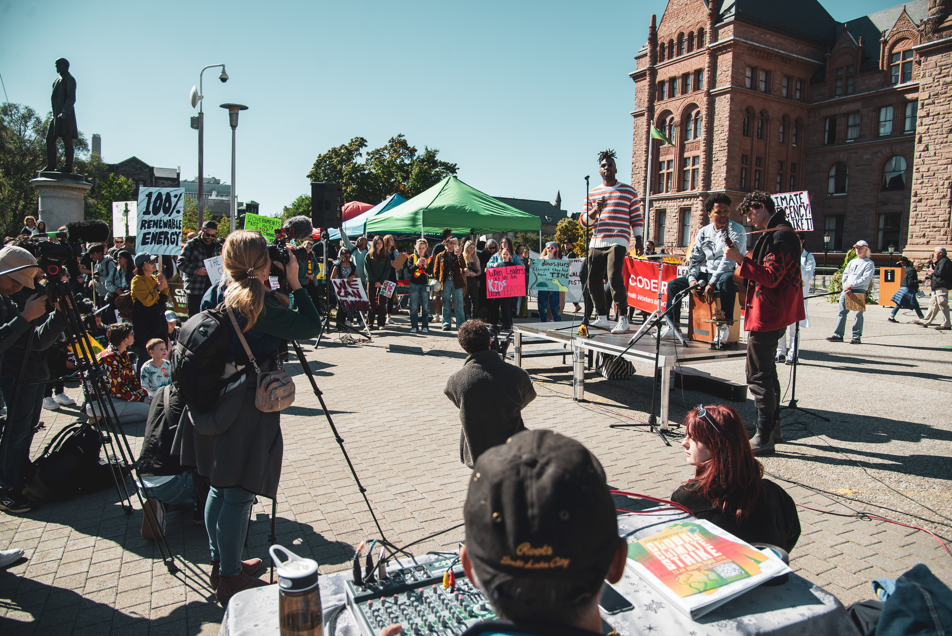 Jamaican musician and LGBTQ+ activist Mark Clennon performs at the climate rally. (Aloysius Wong)