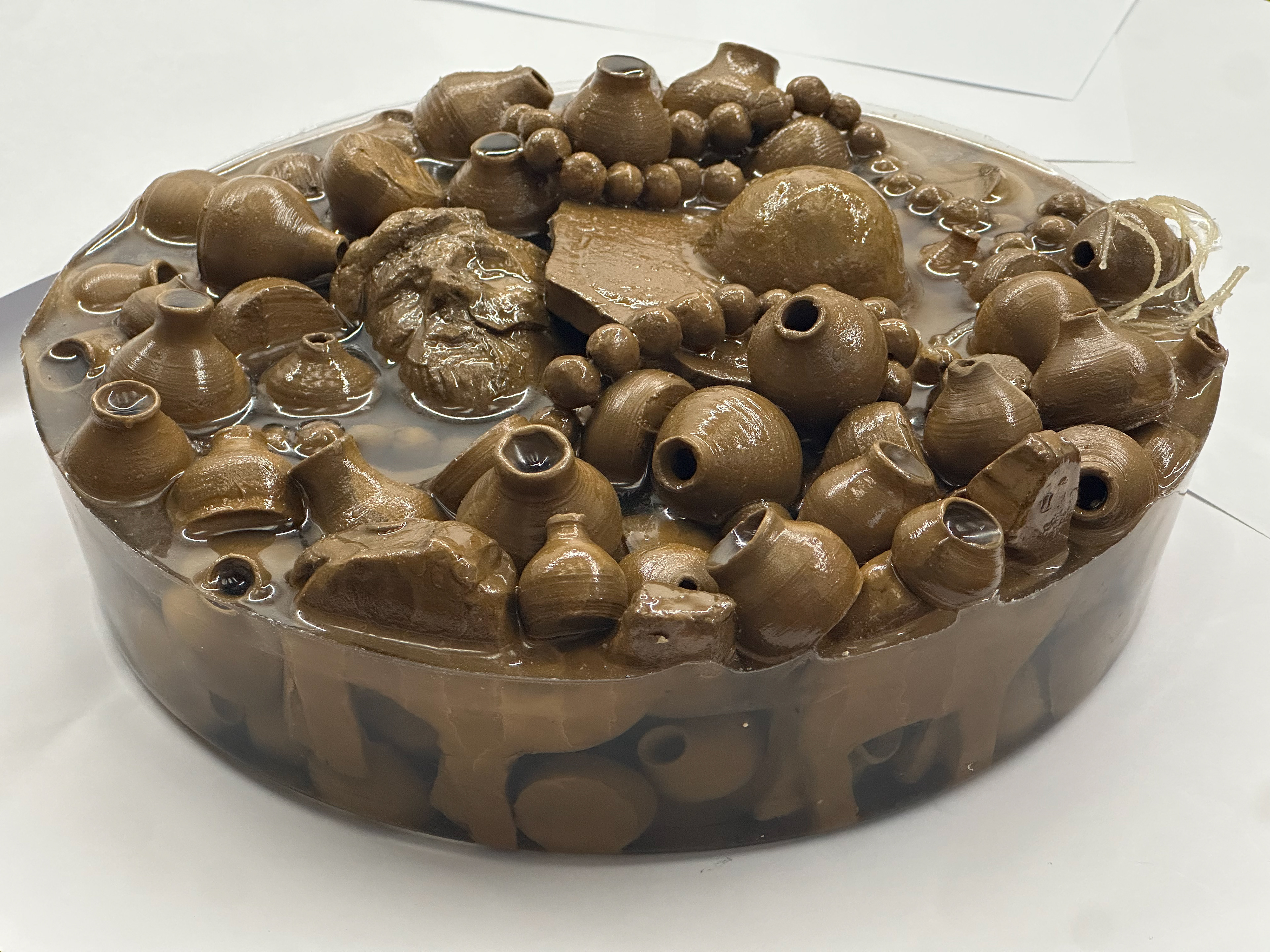 Rumination (Front view: Camels, jars, Head of Christ, Dome of the Rock, Islamic rosary), 2023-2025, Mixed technique (Clay, String and Epoxy Resin), 25cm*8cm*25cm