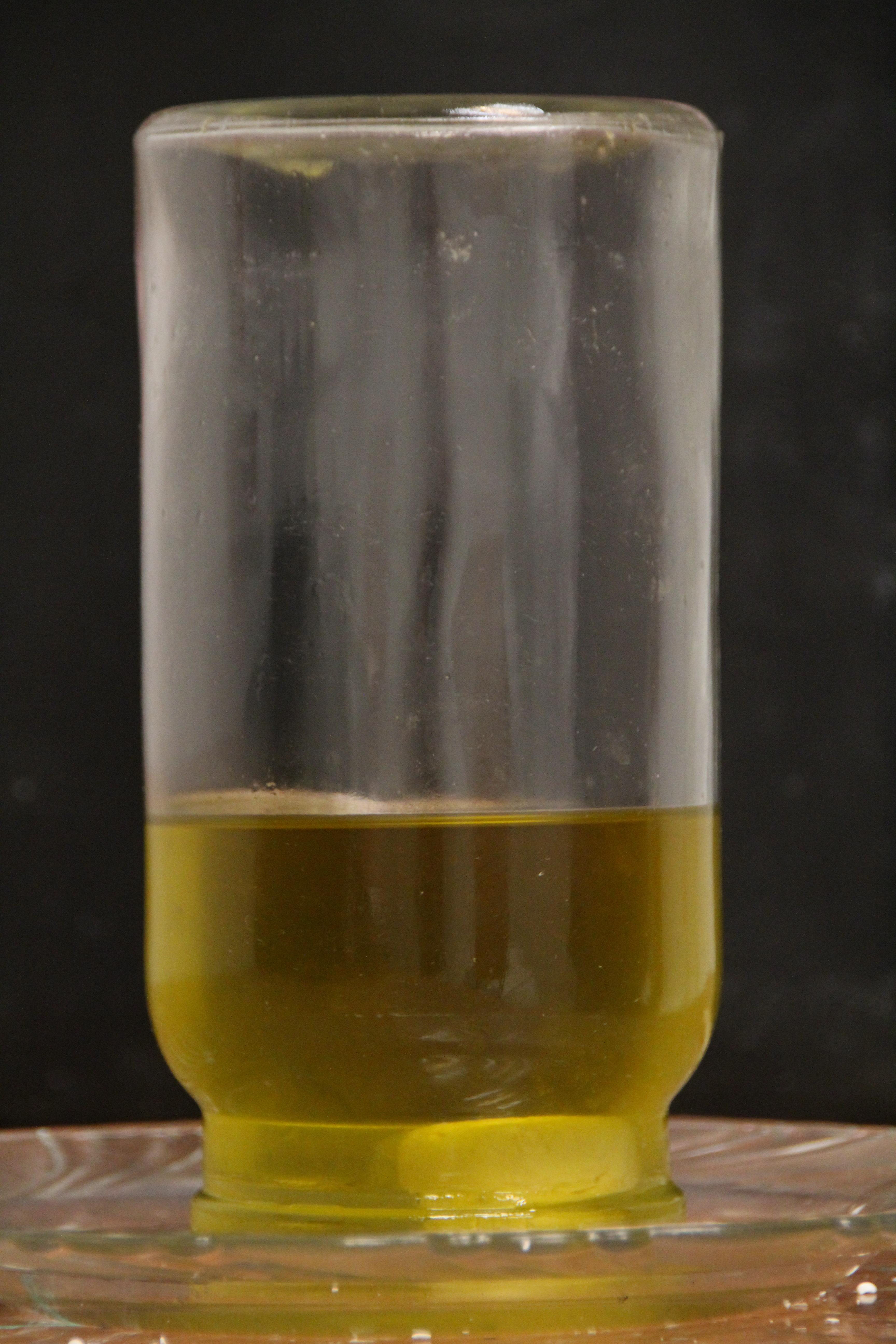 Silent Voice 2016, ready made (glass , olive oil and labaneh ball) 