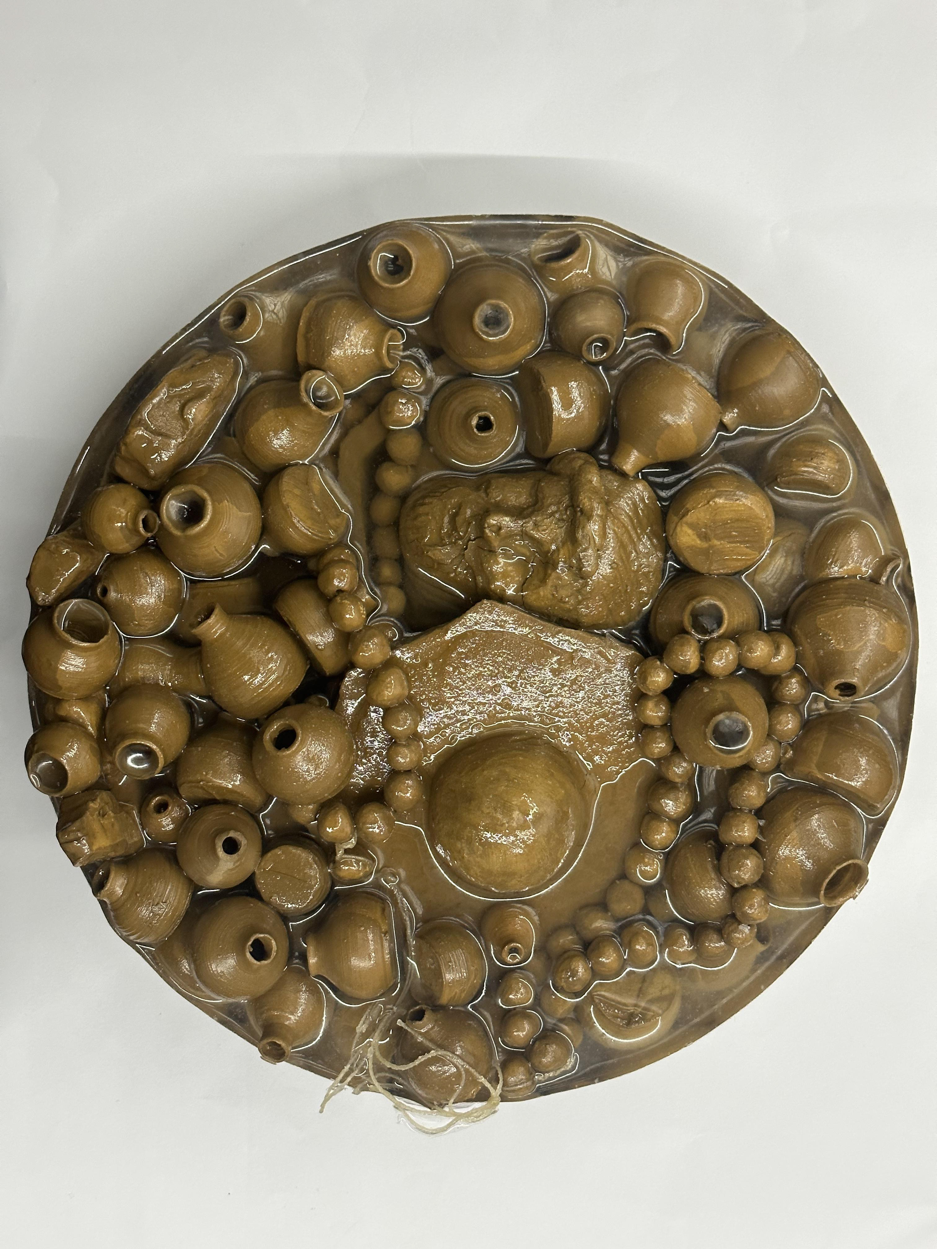 Rumination ( Top view: Camels, jars, Head of Christ, Dome of the Rock, Islamic rosary), 2023-2025, Mixed technique (Clay, String and Epoxy Resin), 25cm*8cm*25cm