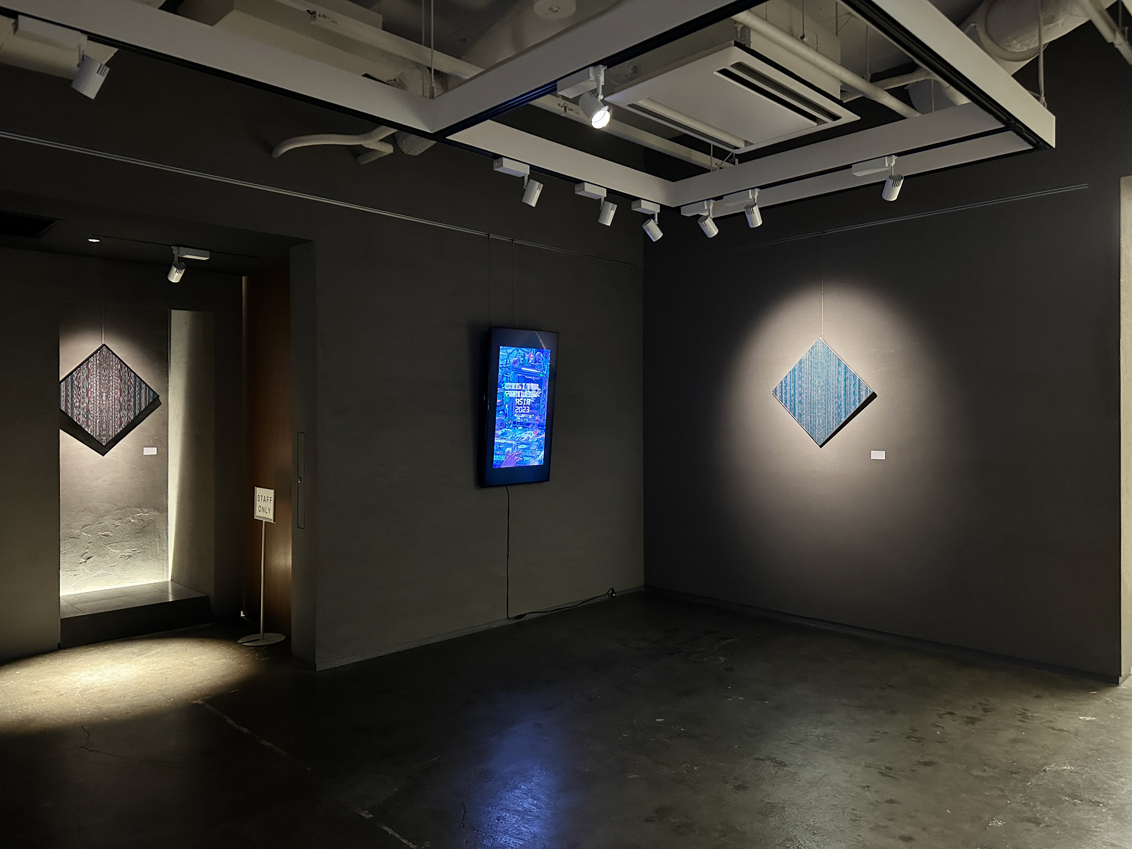 Works of art laboriously made using Japanese mizuhiki strings, drawing parallels to individual pixels forming a digital work