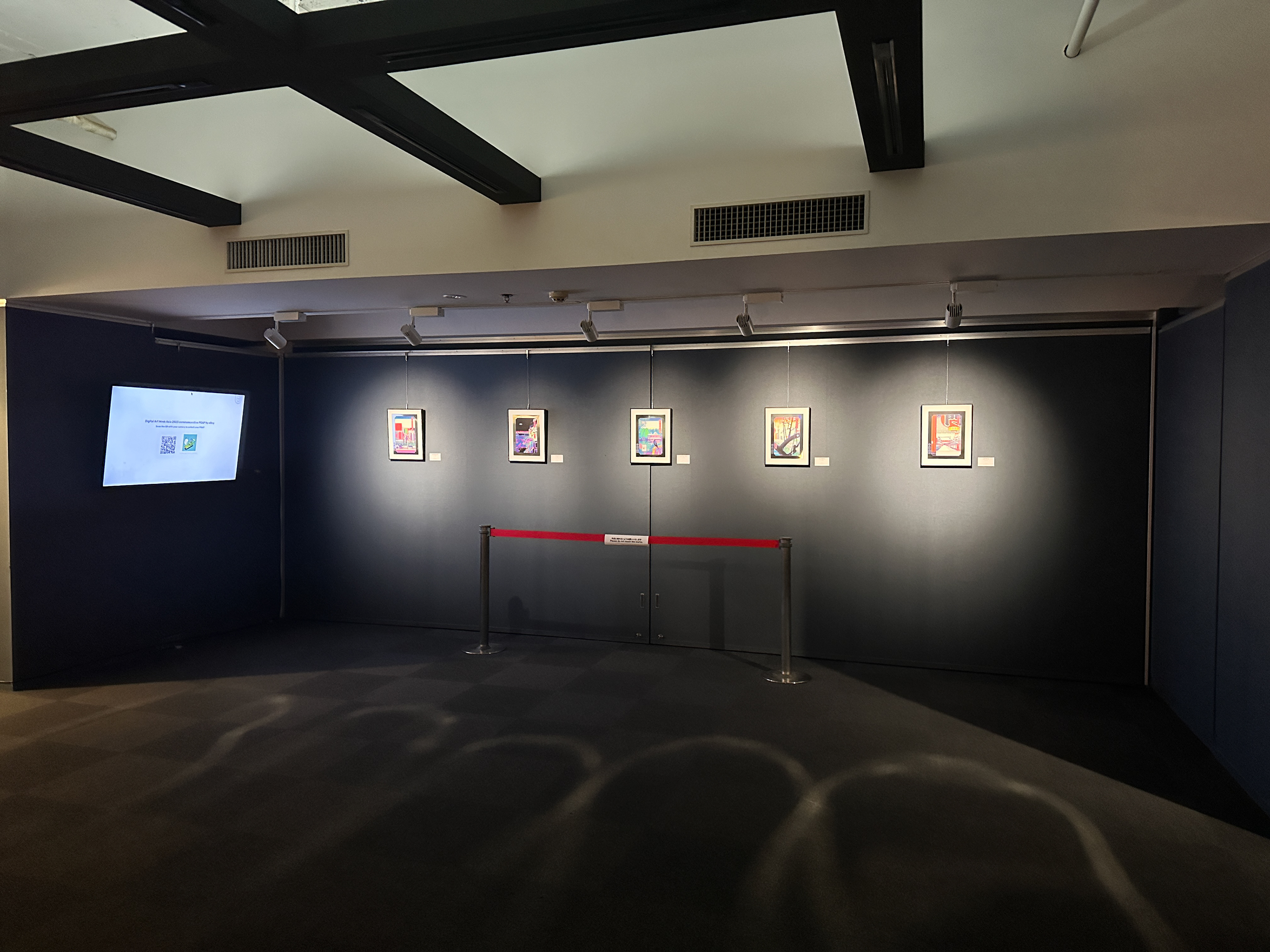 From left: Basement level free NFT collection point and pixelated prints, a homage to traditional Ukiyo-e prints