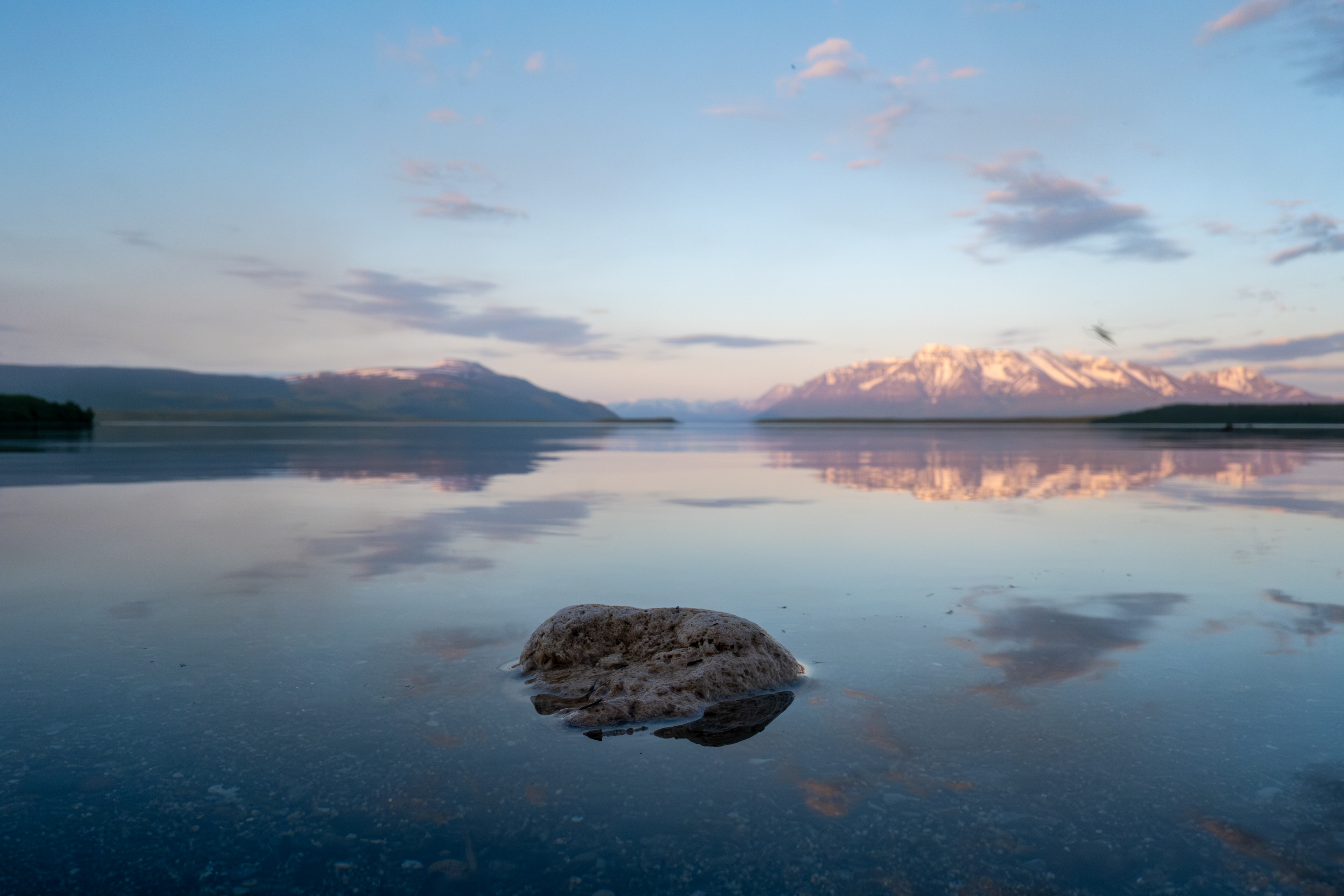 Pumice floating on the lake surface, mosquitos everywhere.
