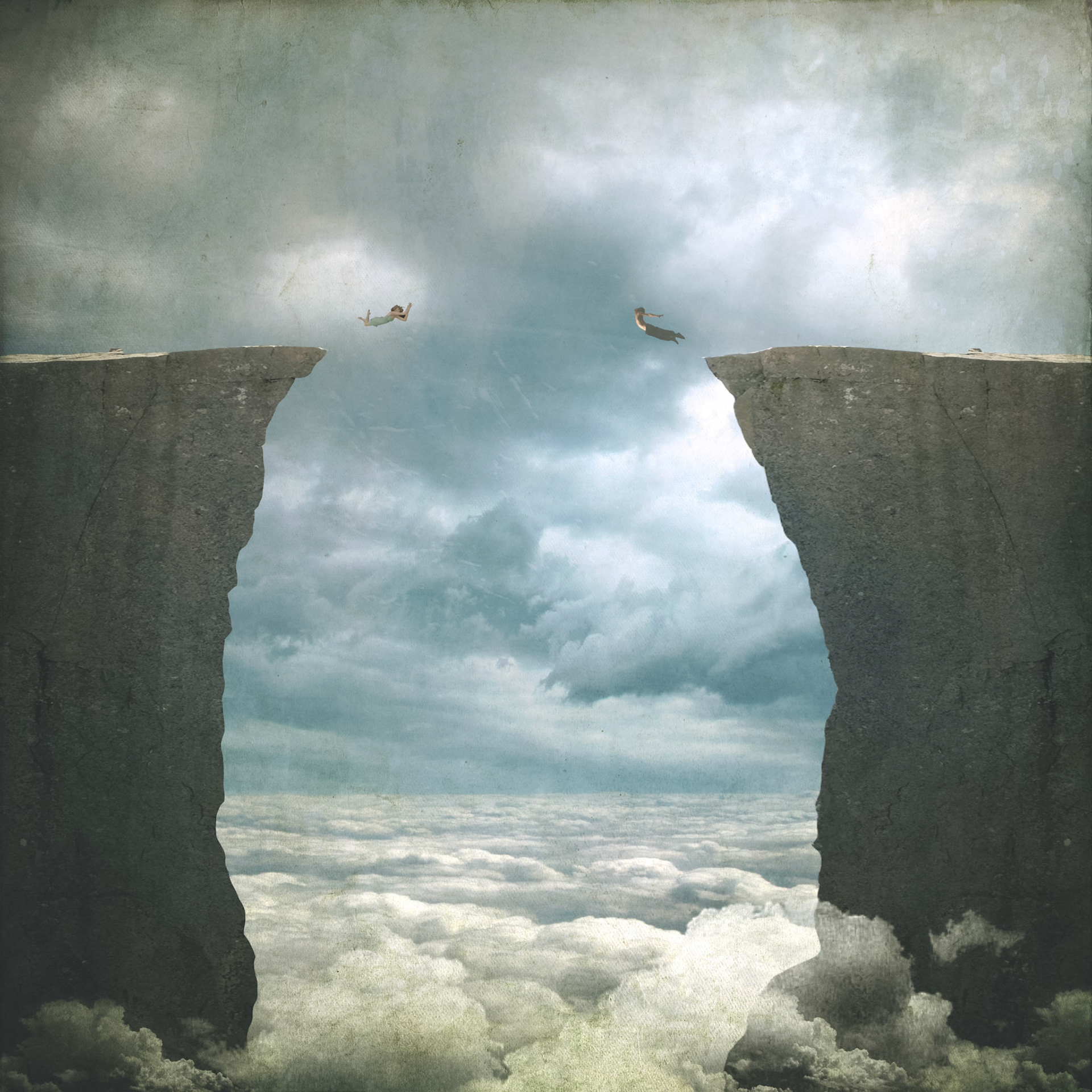 Two human figures appear to be flying or falling between two towering cliff faces, with a sea of clouds below them.