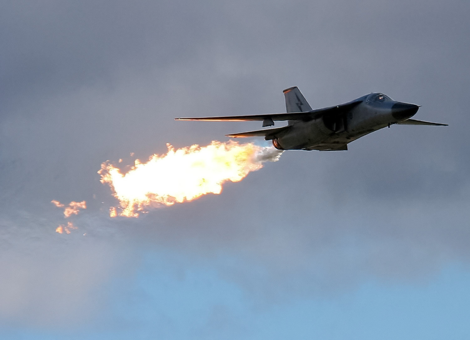 A General Dynamics F-111C Aardvark aircraft from the Royal Australian Air Force performs a dump-and-burn maneuver.