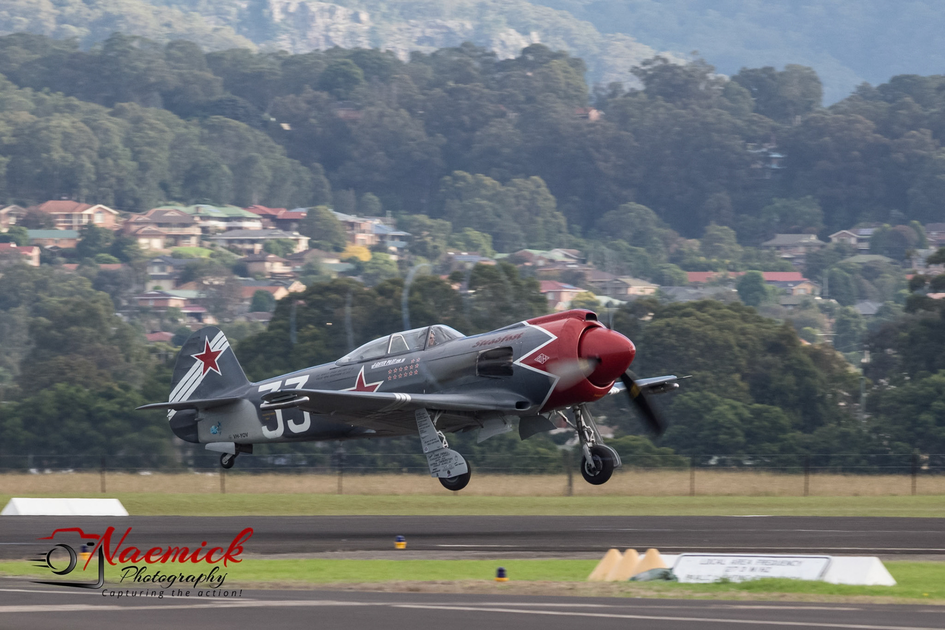 A Yak-3 “Steadfast” warbird, VH-YOV, in flight at the HARS Aviation Museum in Albion Park Rail, New South Wales, Australia.