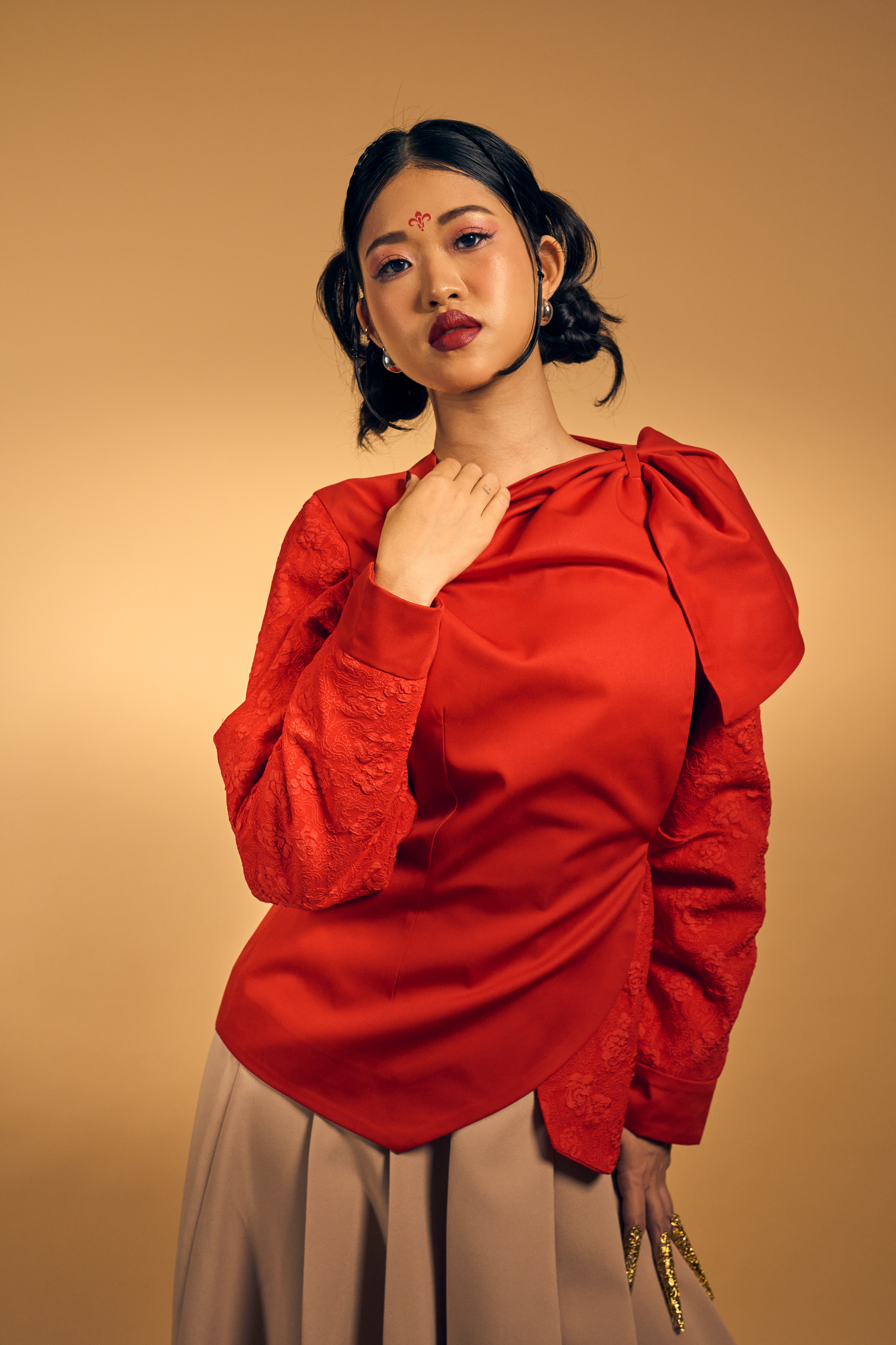 Silent Bloom A quiet harmony of modern femininity and cultural elegance. Soft silhouettes and blossoming forms express a beauty that grows with grace, not noise.  Shot in Bangkok for Elin, a Raffles International College student mini collection.