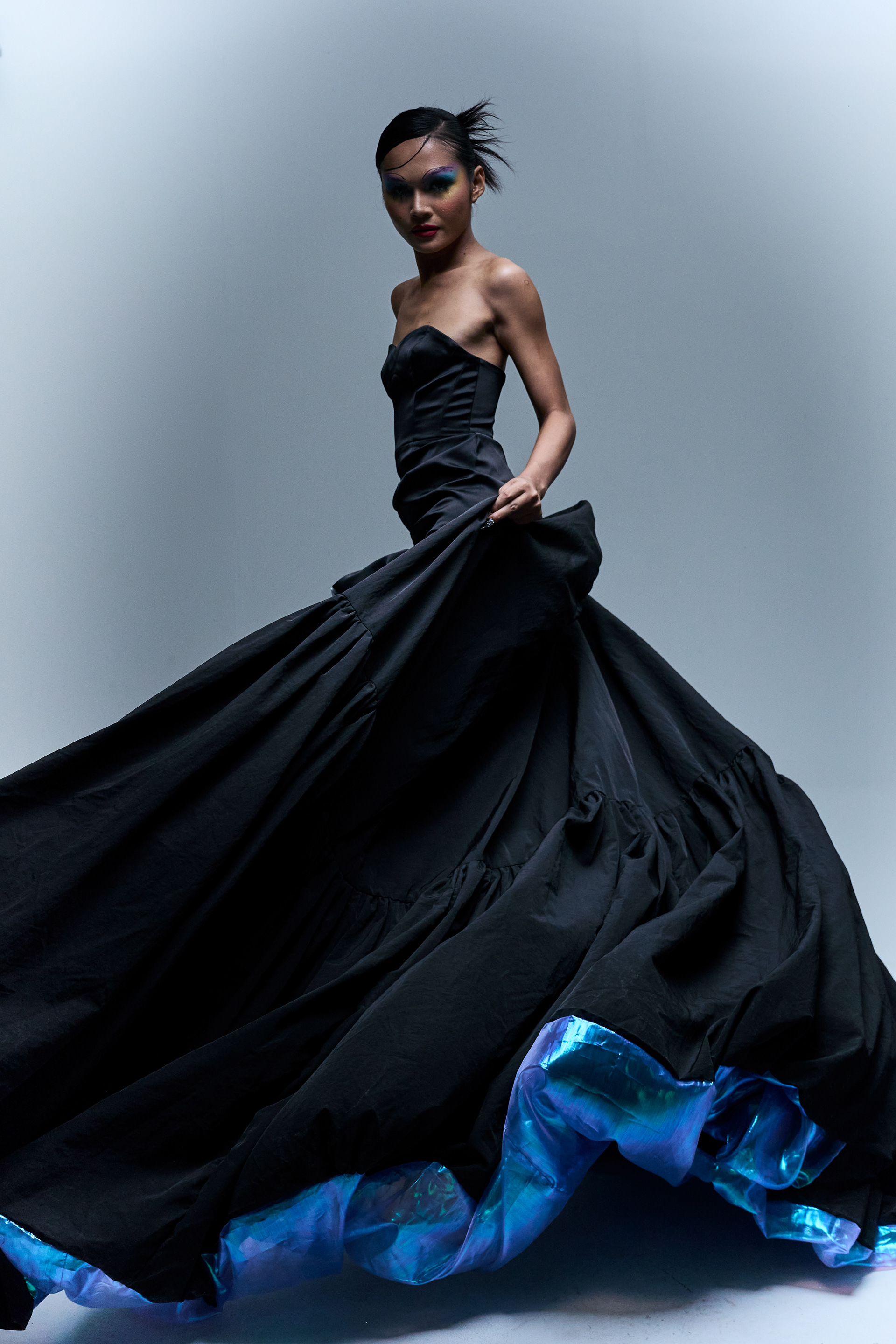 Raison d’être — Hidden Truly  What is seen, and what remains concealed.  A fashion editorial exploring hidden identity and quiet tension through layered form and subtle expression. Shot in Bangkok for a Raffles International College mini collection.