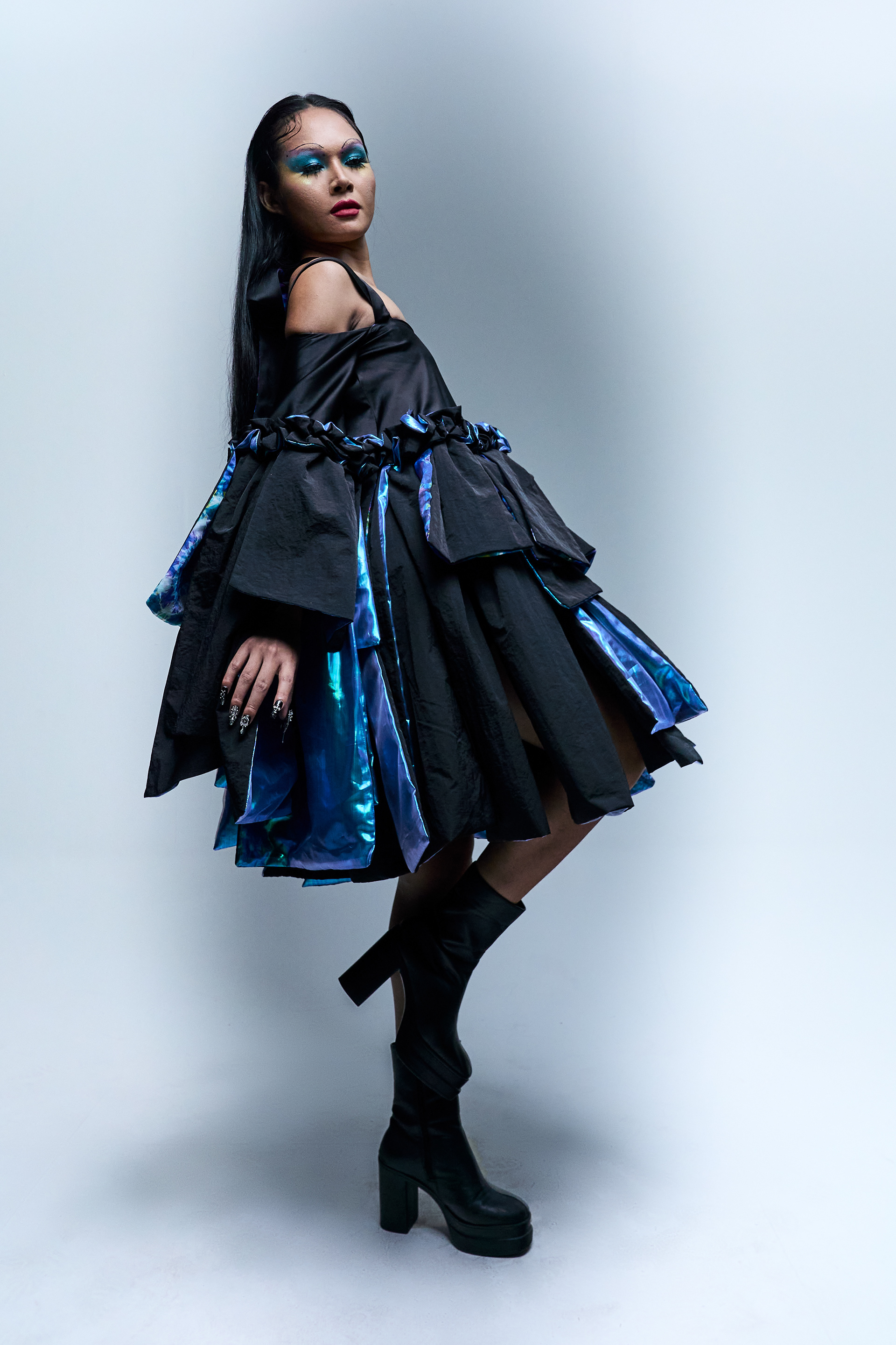 Raison d’être — Chromatic Ripple  Color in motion, form in transition.  A fashion editorial exploring fluid movement and tonal expression through layered color and silhouette. Shot in Bangkok for a Raffles International College mini collection.